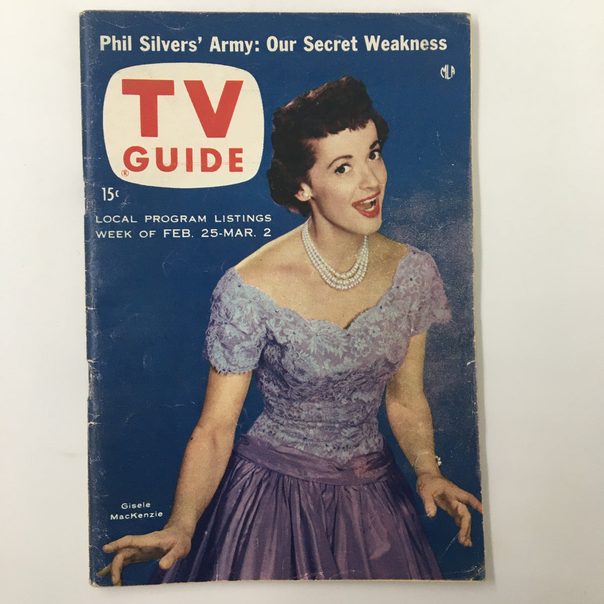 TV Guide Magazine February 25 1956 featuring Gisele MacKenzie on the cover in a vintage purple dress, showcasing classic television nostalgia from the mid-20th century.