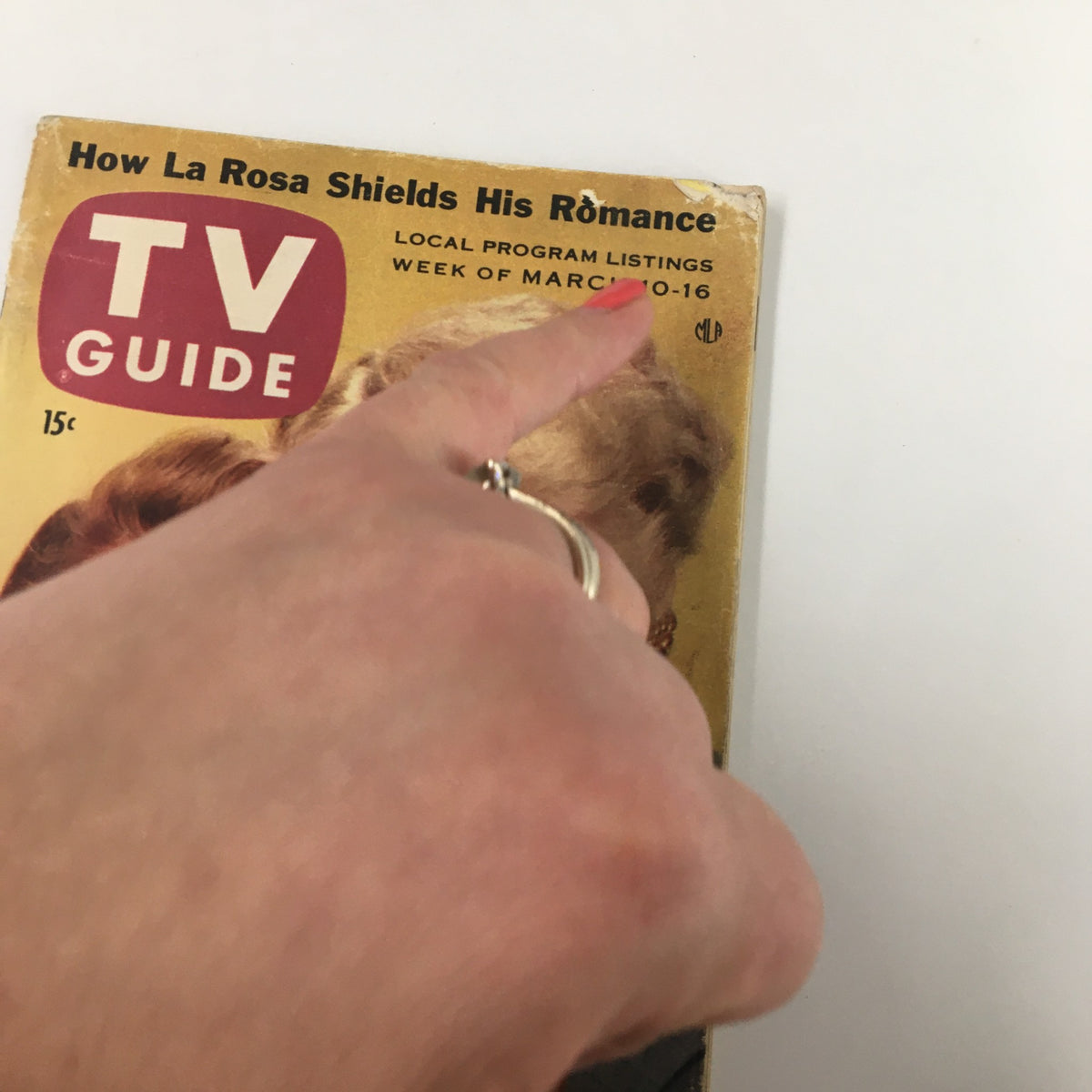 Close-up of the cover of TV Guide Magazine March 10 1956 showing local program listings and the title 'How La Rosa Shields His Romance'.
