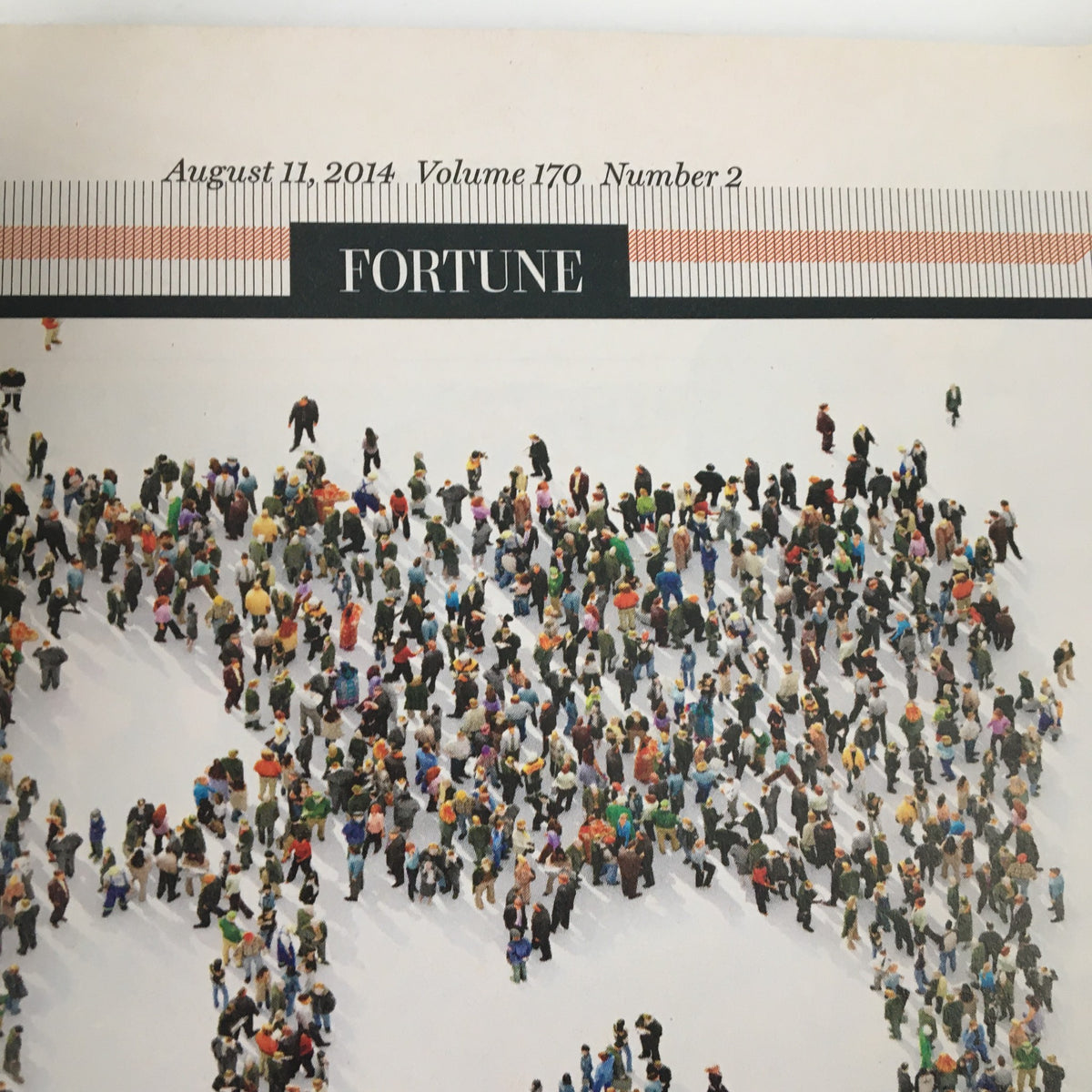 Top section of Fortune Magazine from August 11, 2014, displaying the magazine's title and an illustration of crowds, representing the themes of migration and investment related to the EB-5 Visa Program.