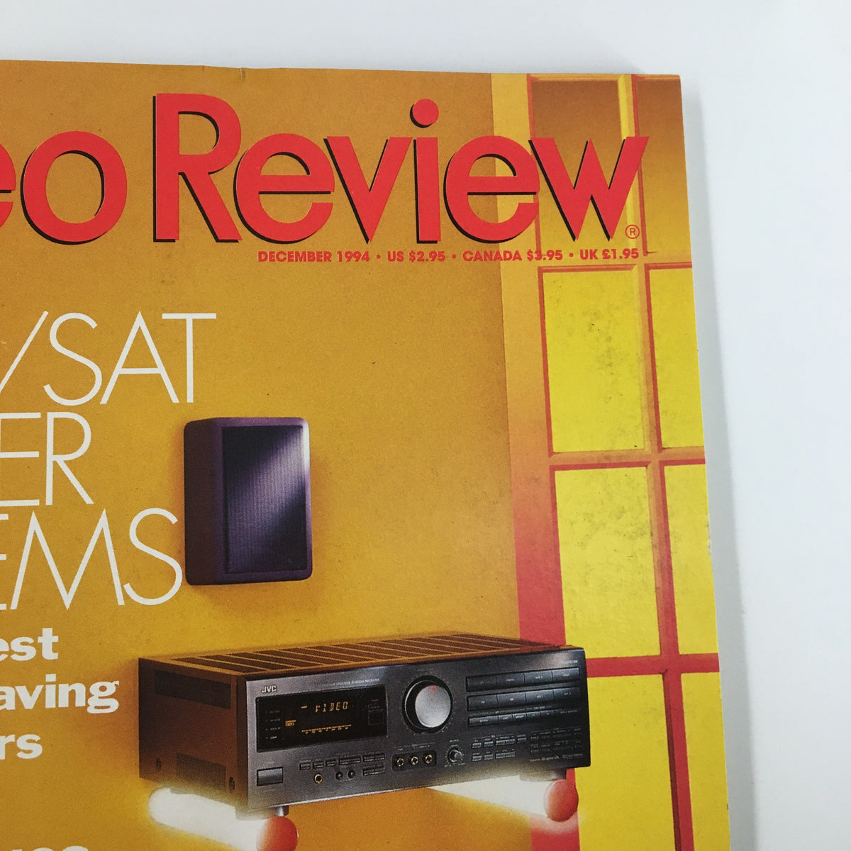 Close-up of the cover of Stereo Review Magazine December 1994 showcasing 'Sub/Sat Speaker Systems' and details about space-saving stereo technology.