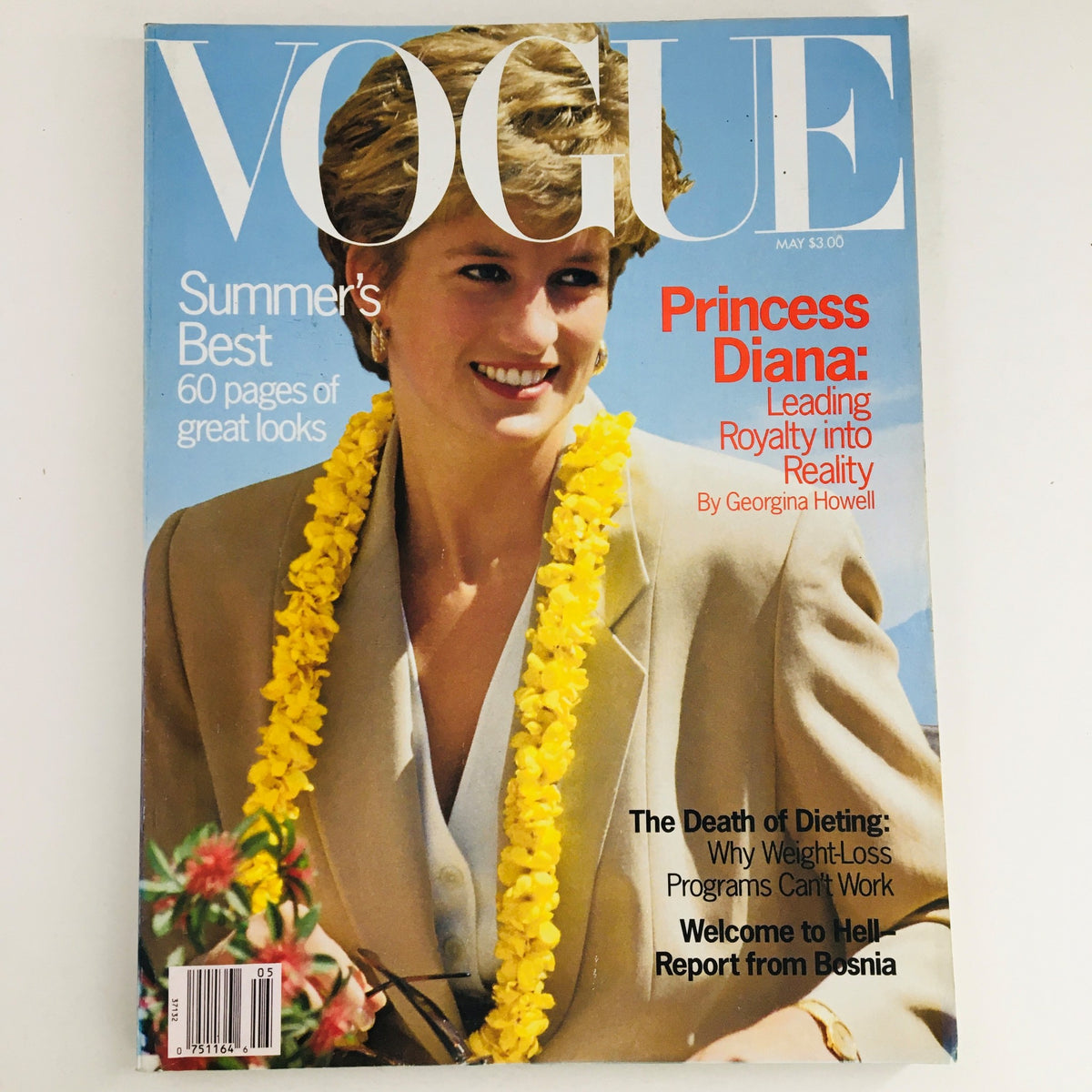 Vogue Magazine May 1993 featuring Princess Diana on the cover, showcasing her radiant smile and wearing a floral necklace, emphasizing the summer's best fashion trends. A must-have collectible from Original Magazines for fans of fashion and royal history.