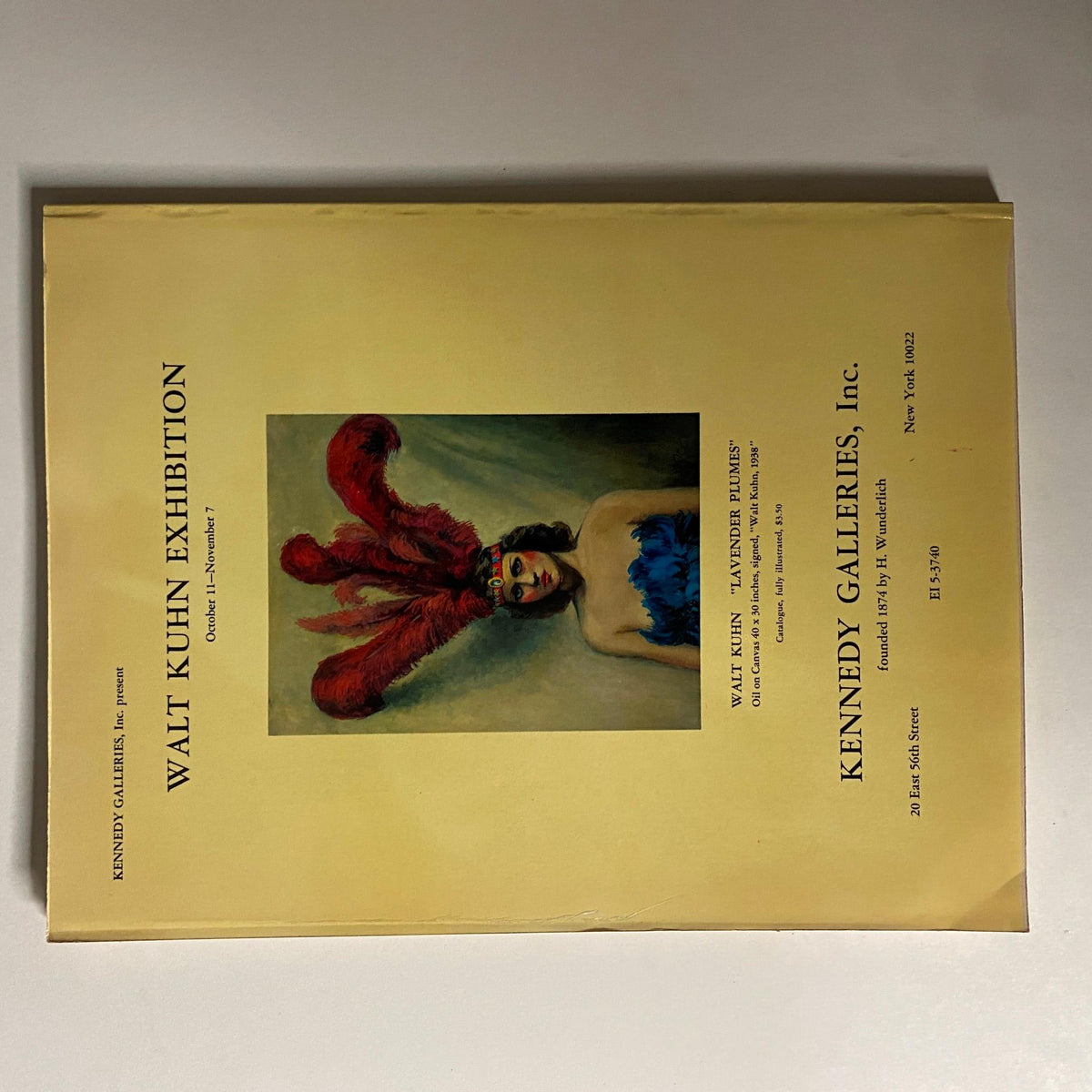 Cover of the Walt Kuhn Exhibition catalog, featuring a painting with vibrant colors and a striking portrait, dated October-November.