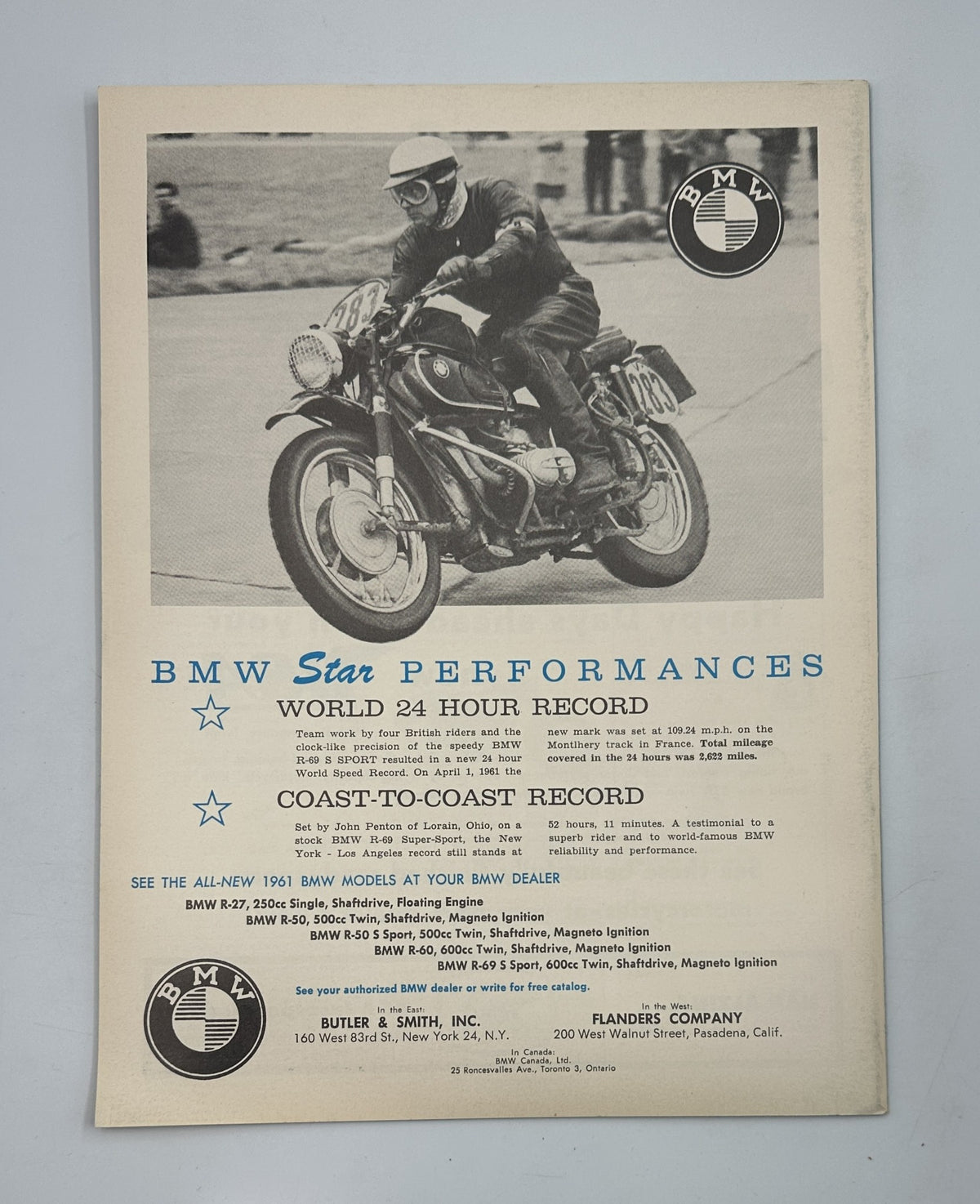 Advertisement from Cycle Magazine October 1961 promoting BMW Star Performances, highlighting motorcycle records and offerings.