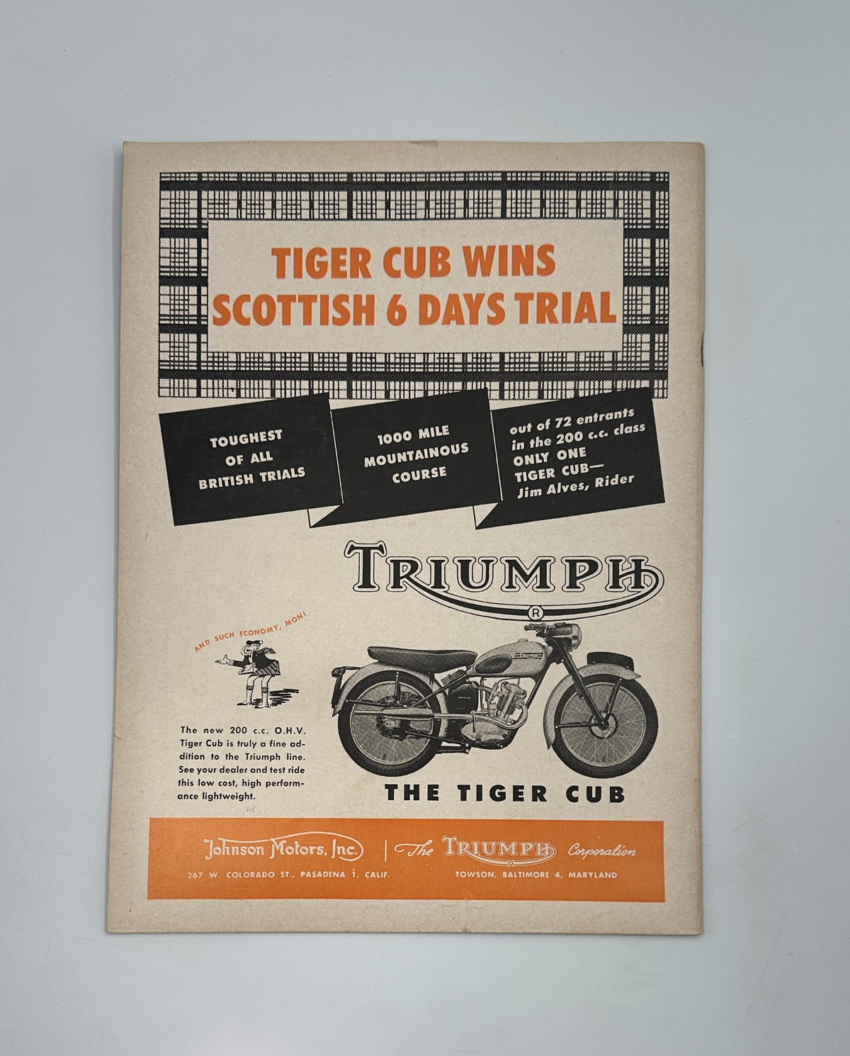 Back cover of Cycle Magazine August 1954 promoting the Triumph Tiger Cub motorcycle, detailing its specifications and achievements in trials.