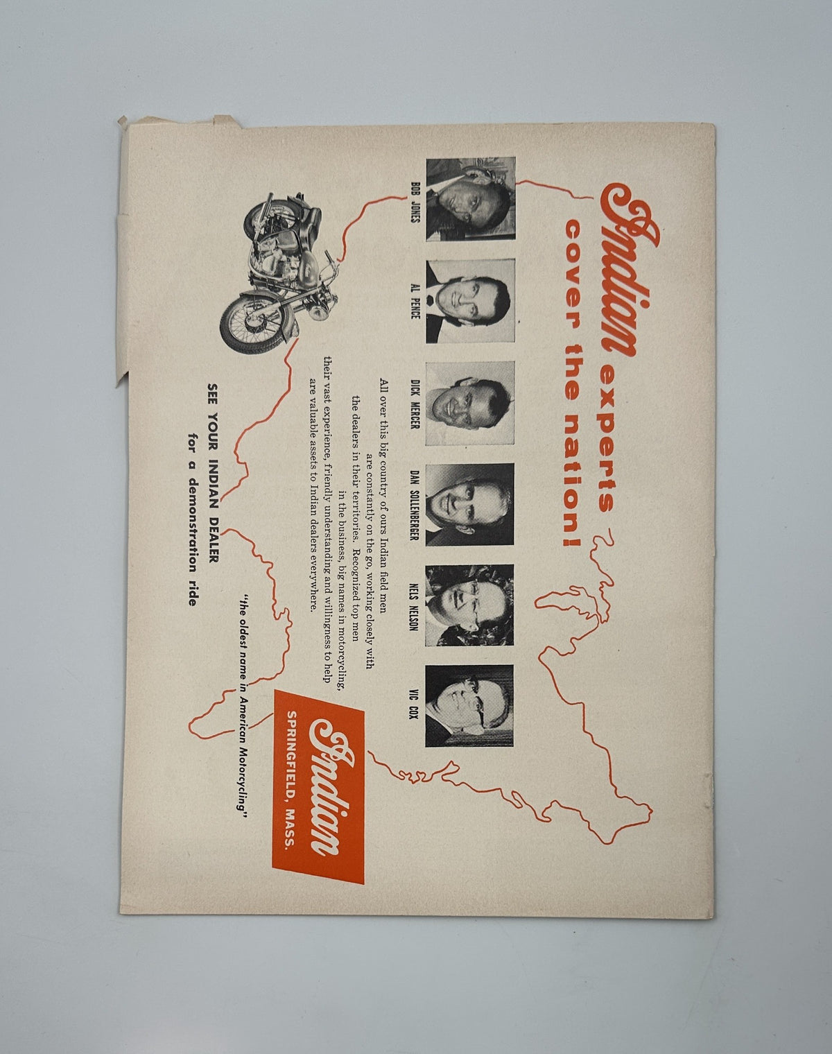 Advert from Cycle Magazine November 1955 showcasing Indian motorcycle experts, featuring images of five individuals and a motorcycle on a map of the United States. Relevant to the Pikes Peak Triumph BSA Peoria TT issue.