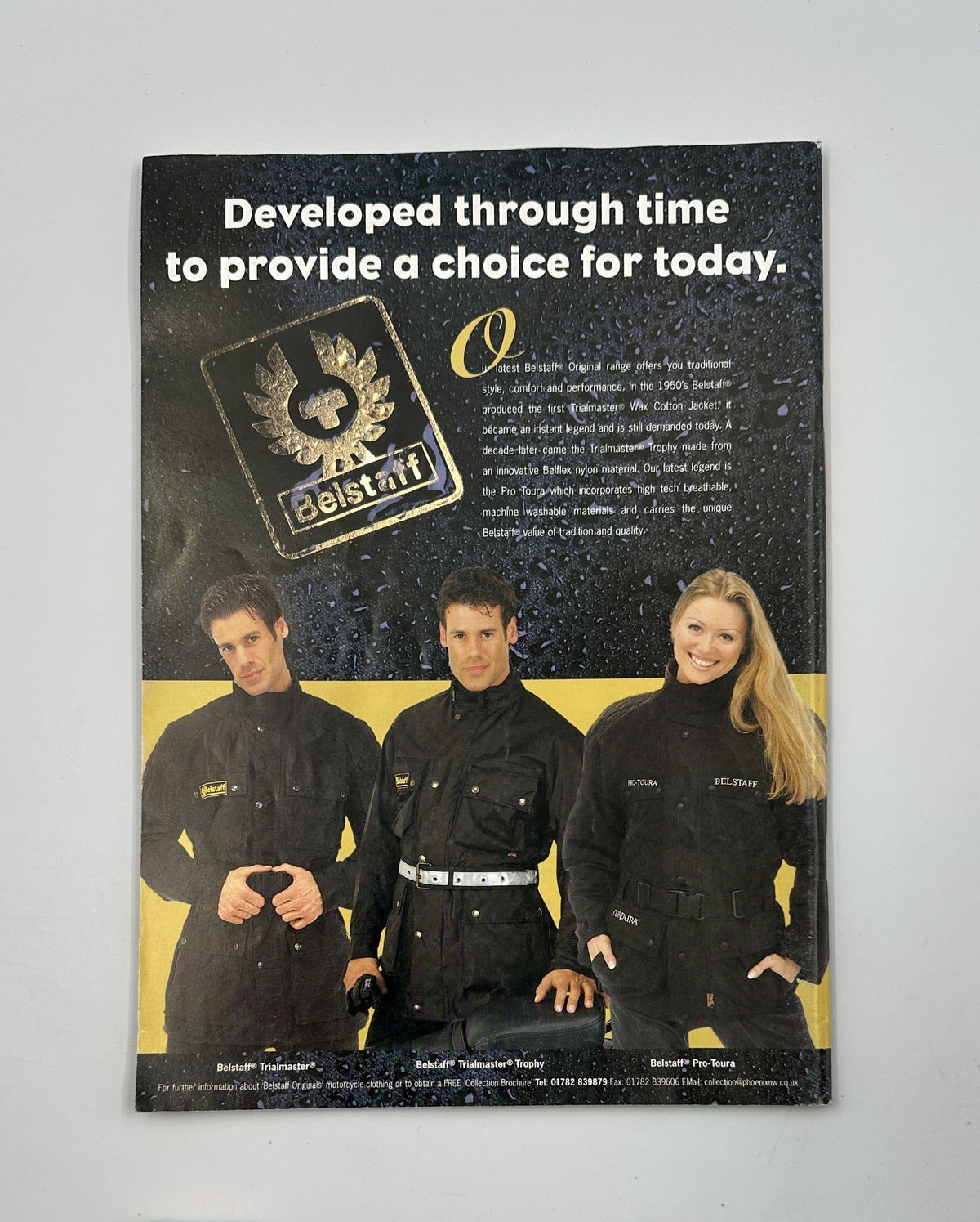 Advertisement for Belstaff showcasing three models in waterproof gear, emphasizing durability and choice, featured in Classic Bike Magazine November 1998 alongside the Ducati 750 V-Twin and Brough SS100.