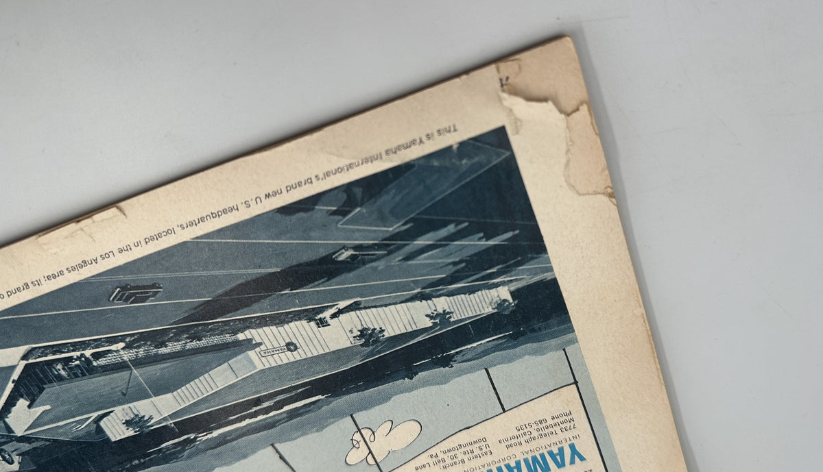 Back cover of Cycle Magazine January 1965 showing advertisements and details about Yamaha's new models, with noticeable wear and tear on the edges.