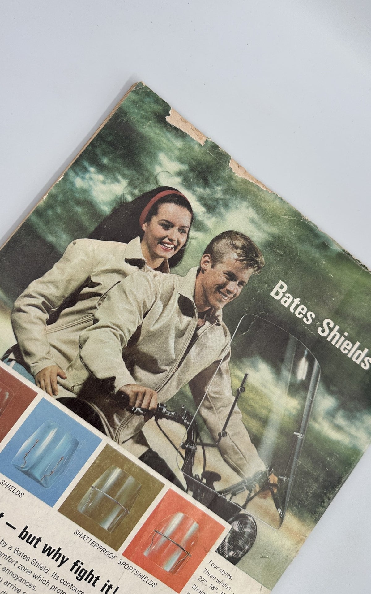 Back cover of Cycle Magazine, October 1966 featuring a vintage advertisement for Bates Shields, showcasing a couple on a motorcycle wearing protective gear.