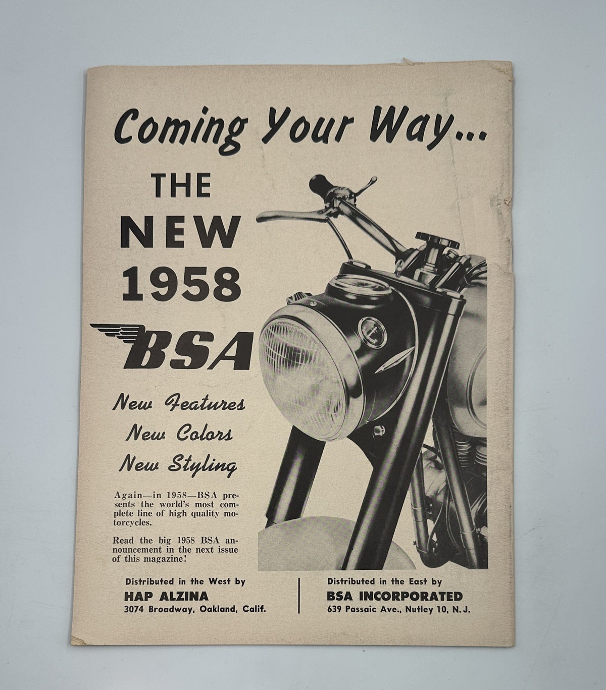 Advertisement in Cycle Magazine January 1958 promoting the new 1958 BSA motorcycle with details on new features, colors, and styling.