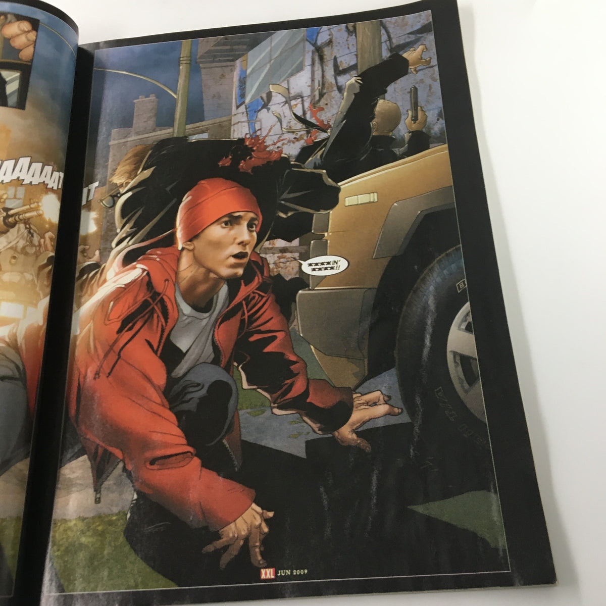 Page from XXL Magazine June 2009 featuring Eminem in a dramatic comic scene, depicting action and tension.