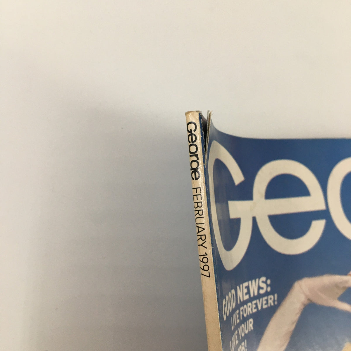 George Magazine February 1997 issue spine showing publication date and details. Collectible vintage magazine featuring Karen Mulder, Bill Gates, and Jimmy Carter.