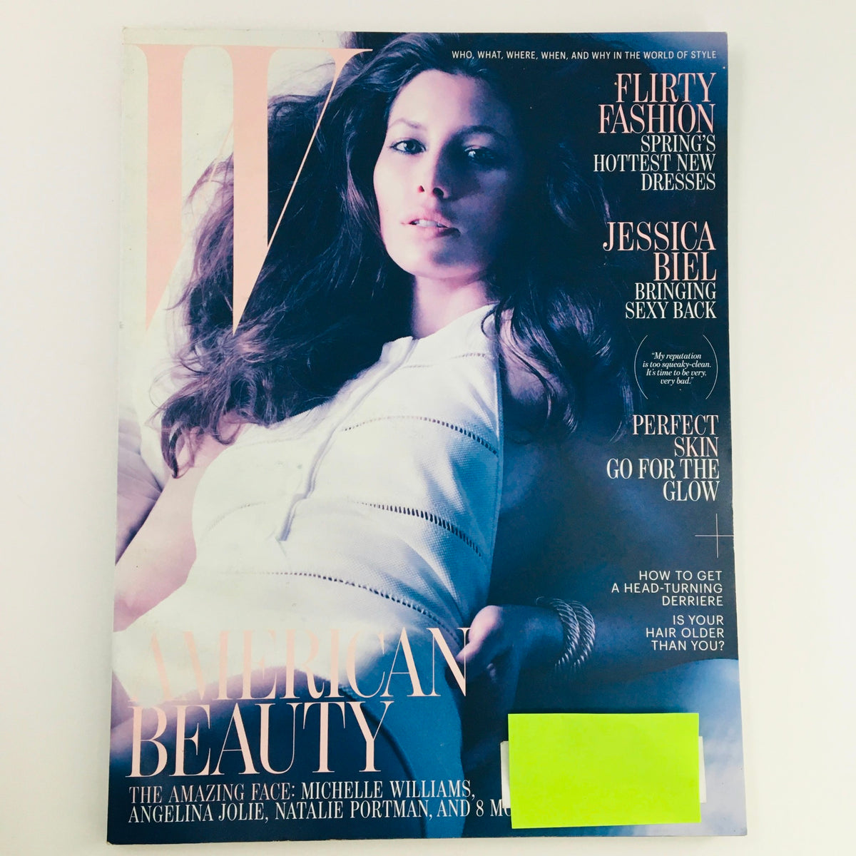 W Magazine April 2012 cover featuring American actresses Jessica Biel and Angelina Jolie, highlighting themes of flirty fashion and beauty.