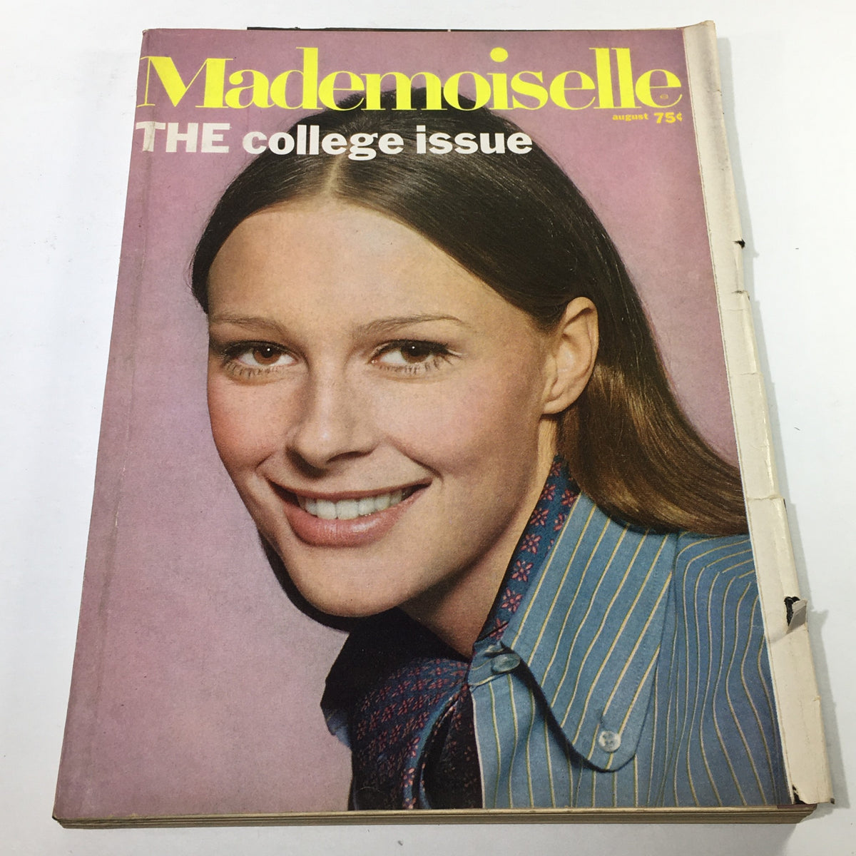 Cover of VTG Mademoiselle Magazine: April 1967 - The College Issue, featuring a smiling model in a blue striped shirt against a pink background.