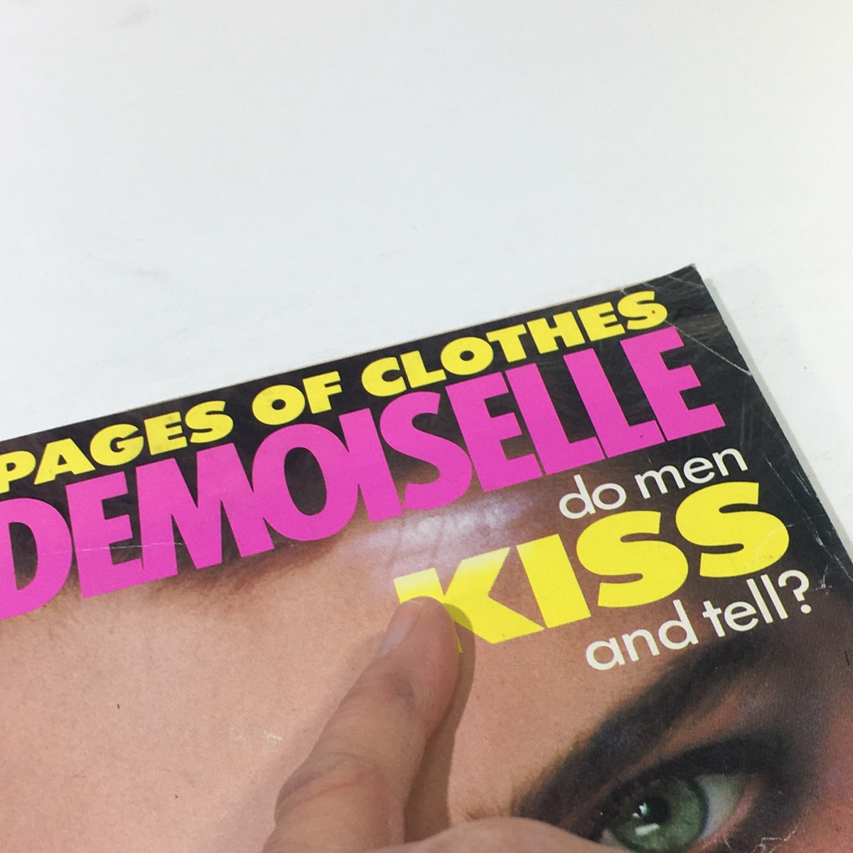 Close-up of the cover of Vintage Mademoiselle Magazine July 1983 highlighting the title and promotional text about beauty scoops and fashion tips.