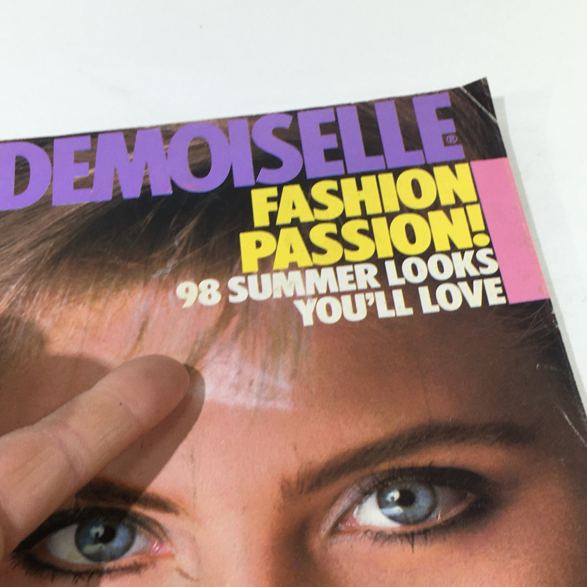 Close-up of the VTG Mademoiselle Magazine July 1982 title with fashion highlights, including 'Fashion Passion!' and '98 Summer Looks You'll Love'.