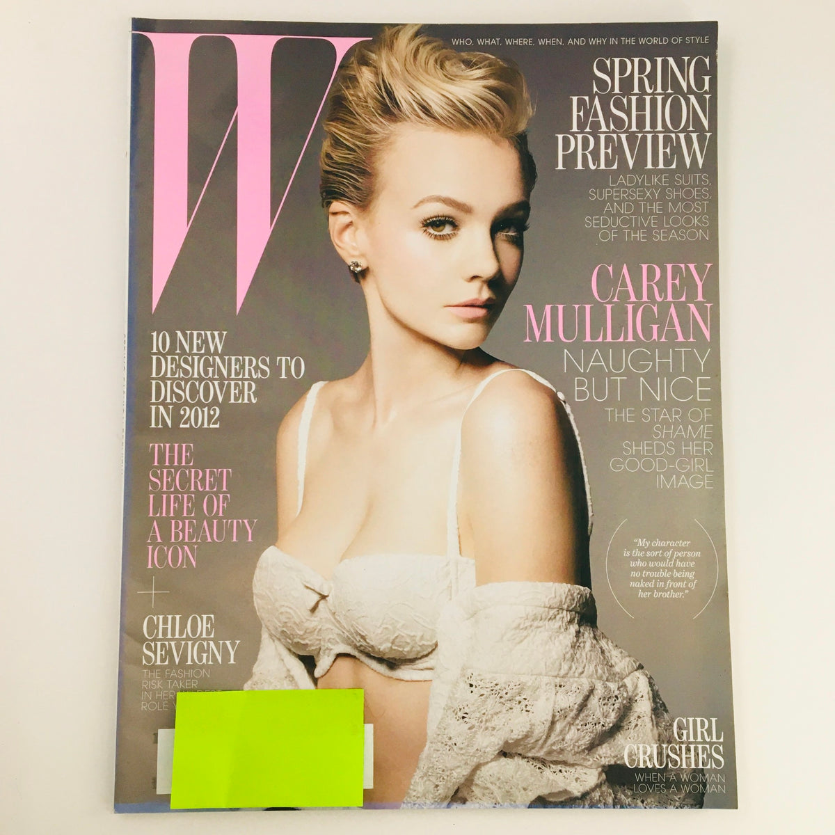 Cover of W Magazine January 2012 featuring English actress Carey Mulligan with the theme "Naughty But Nice." The magazine showcases fashionable styling and highlights contemporary celebrity culture.