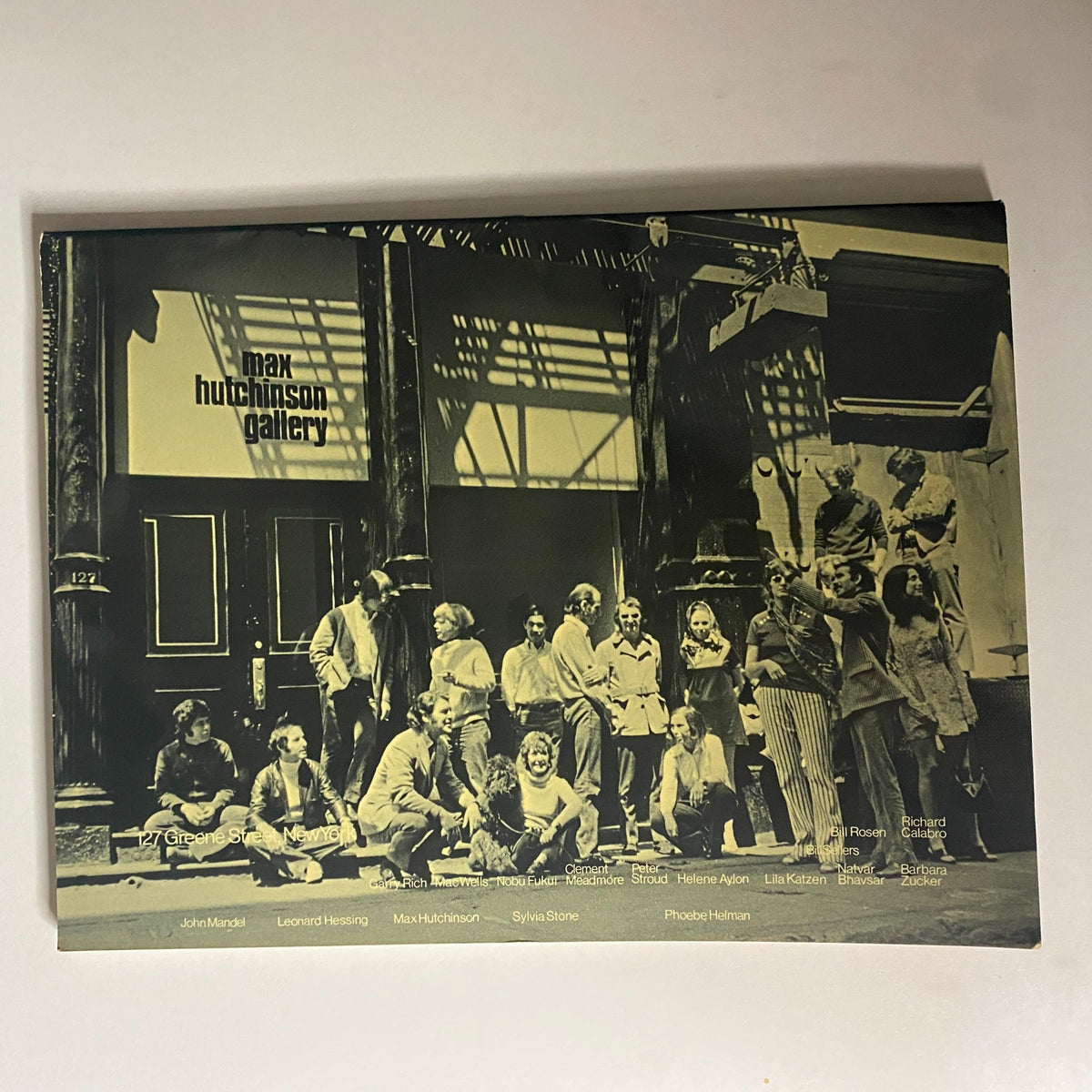 Back cover of Art in America Magazine July 1970, showcasing the Max Hutchinson Gallery with a group of artists and viewers gathered, depicting a lively art scene.