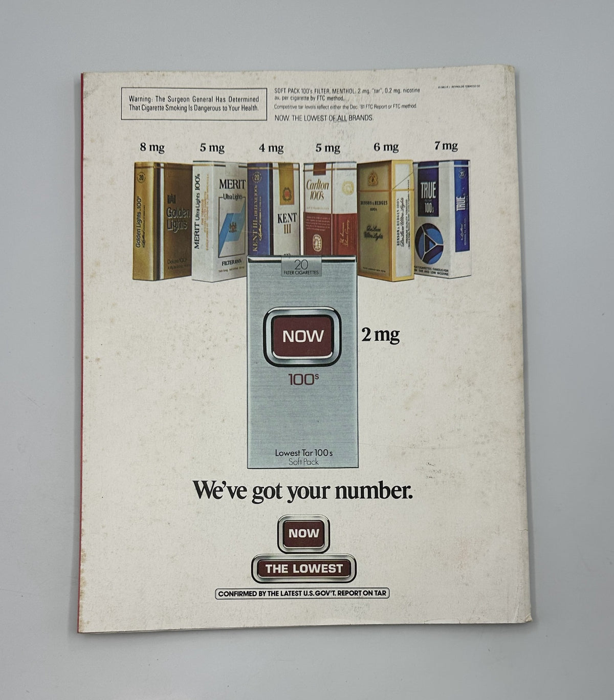 Back cover of Vanity Fair Magazine May 1983 featuring an advertisement for cigarettes, highlighting the product's low nicotine options.