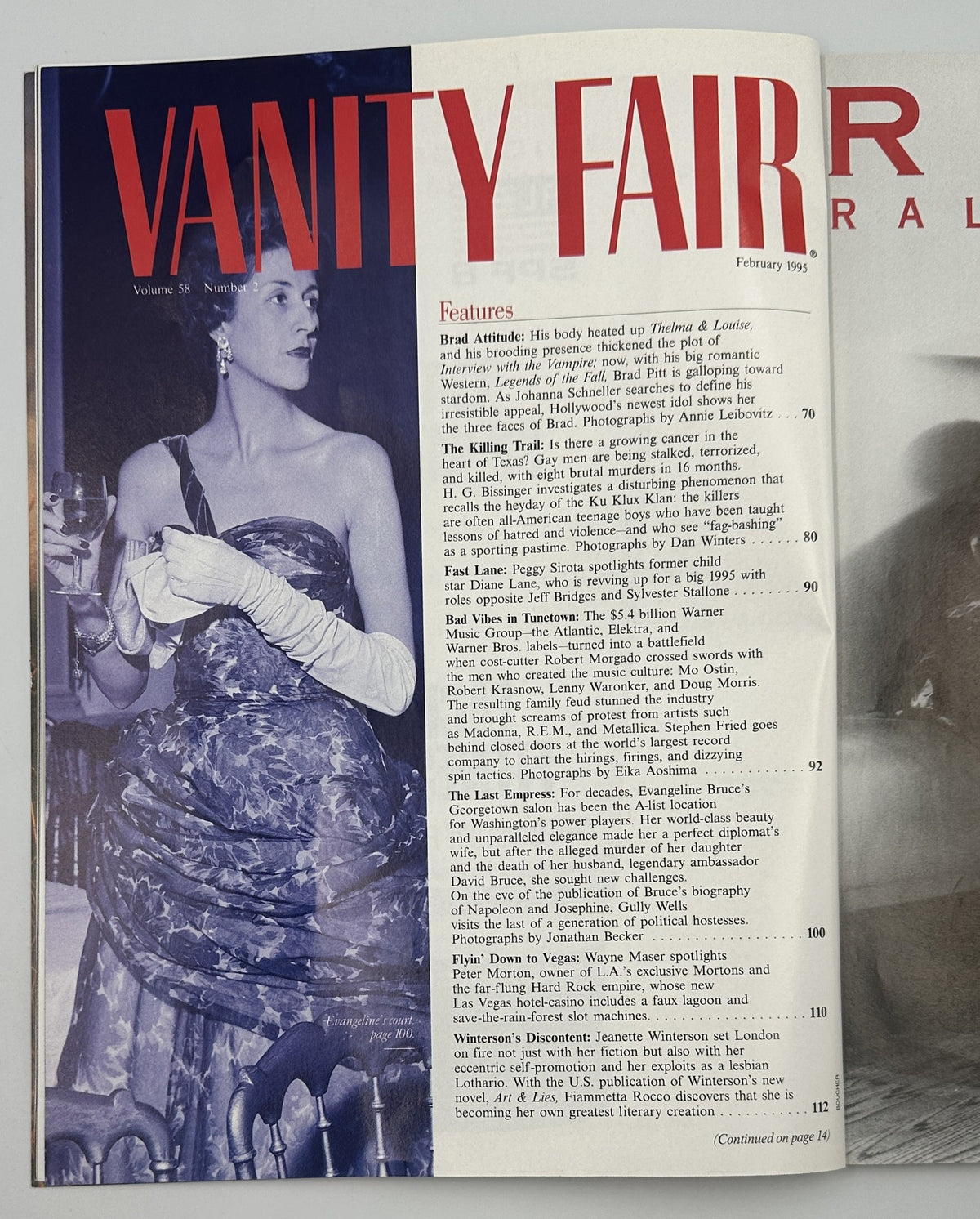 Inside page of Vanity Fair Magazine February 1995, displaying features including Brad Pitt's profile and other articles, with a glamorous black and white photo of a woman in an elegant dress.