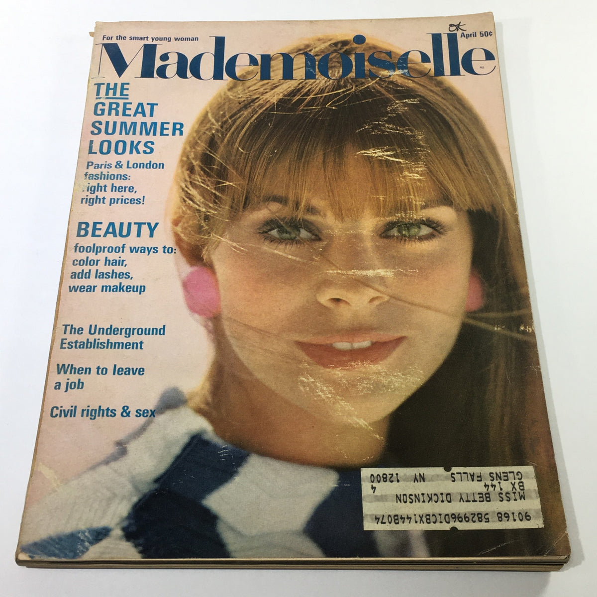 Cover of VTG Mademoiselle Magazine, April 1967 - College Beauty Fashion Issue featuring a young woman with a stylish hairstyle, wearing large pink earrings and a striped top, highlighting summer fashion trends.