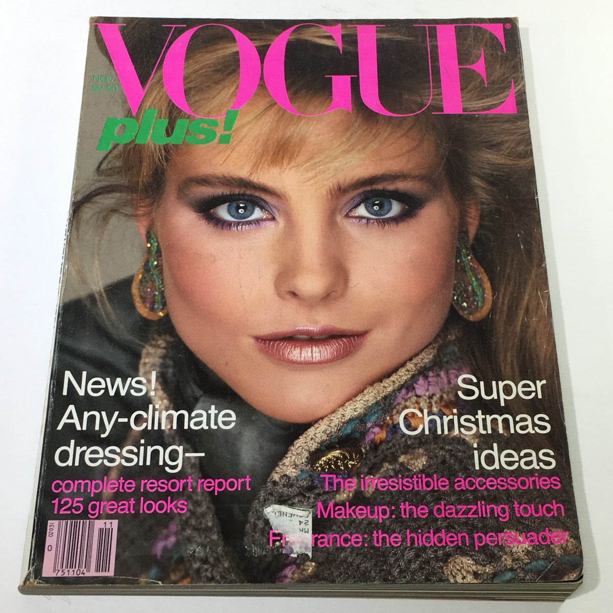 VTG Vogue Magazine Cover - November 1981 featuring a close-up of a model with striking makeup and bold fashion accessories. This vintage issue highlights iconic 1980s fashion trends.