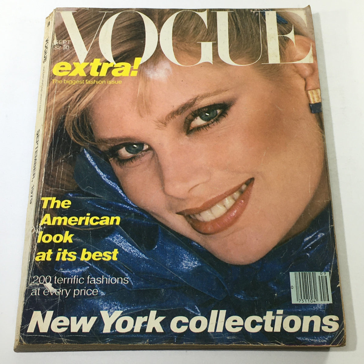 VTG Vogue Magazine: September 1979, featuring iconic cover model Gia Carangi, showcasing late 1970s fashion with a captivating smile and stylish attire. This no-label edition is a remarkable collector's item.