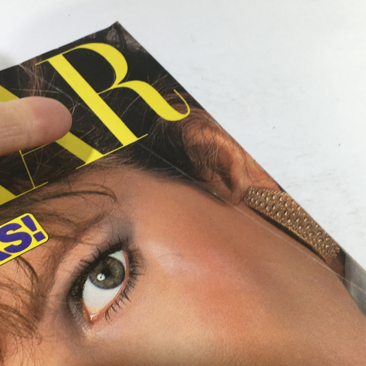 Close-up view of the June 1983 Vintage Magazine Cover with Jaclyn Smith, showcasing detailed facial features and fashion elements.