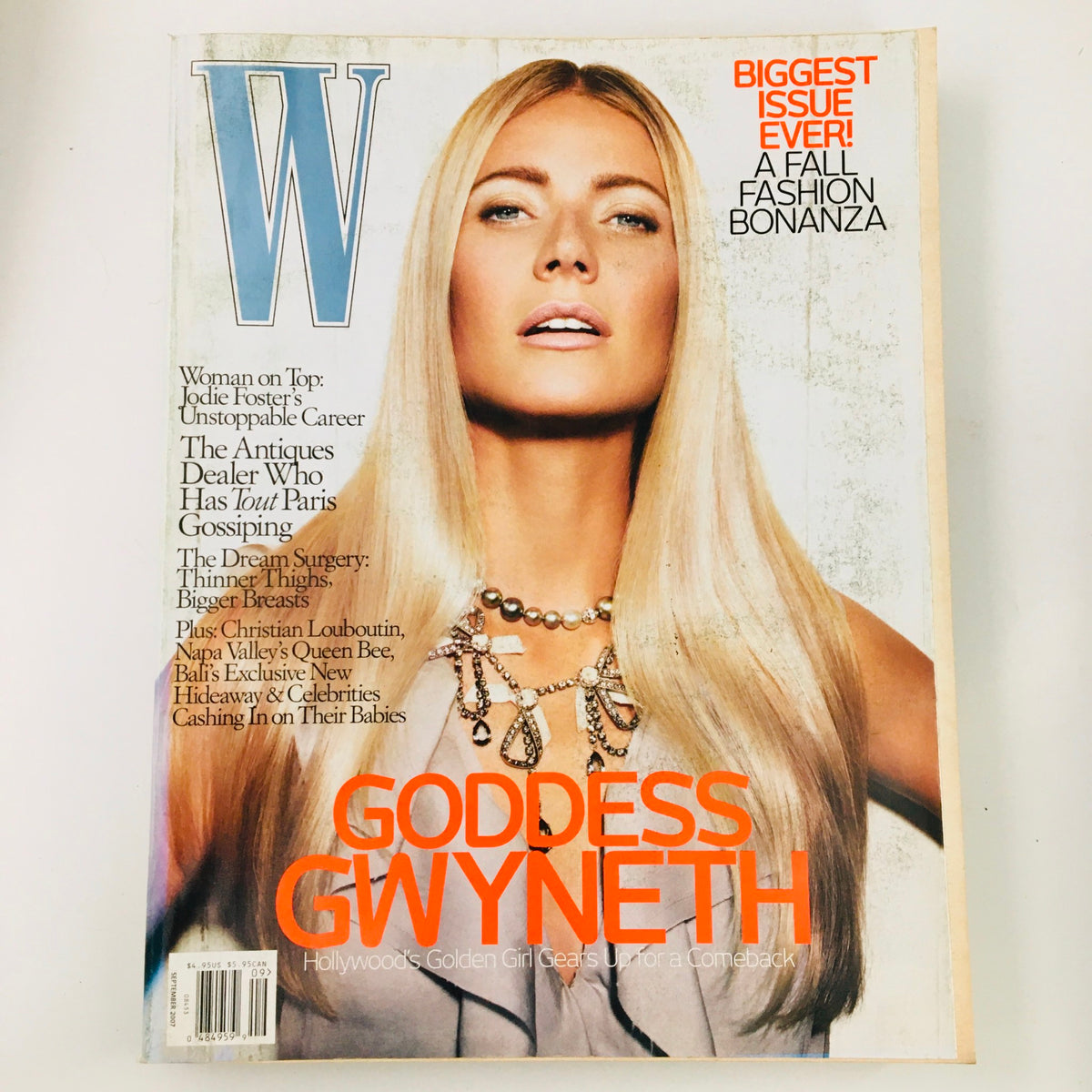 W Magazine September 2007 cover featuring actress Gwyneth Paltrow, showcasing her as Hollywood's Golden Girl in a stunning photoshoot. The cover highlights her elegance and charm, making it a collectible piece for fans of vintage magazines.