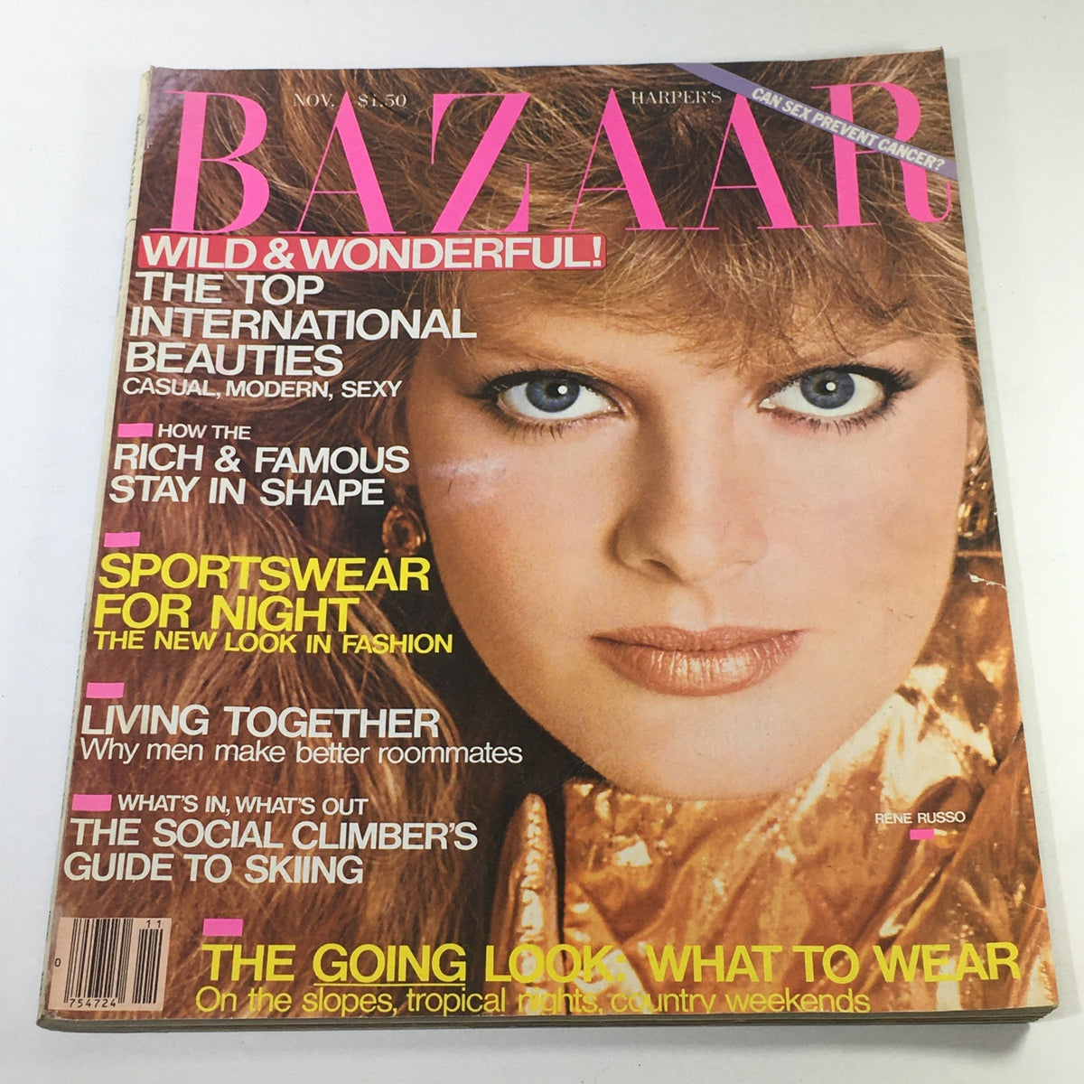 Cover of VTG Bazaar Magazine from November 1980 featuring Rene Russo, highlighting fashion trends and articles such as 'Sportswear for Night' and 'The Top International Beauties'. This vintage magazine is labeled 'No Label/Newsstand' and shows signs of wear including marks and a protective cover.