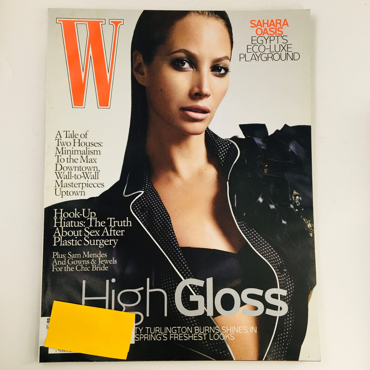 W Magazine January 2009 cover featuring supermodel Christy Turlington with a chic bridal theme and a profile of director Sam Mendes, showcasing high fashion and contemporary style.
