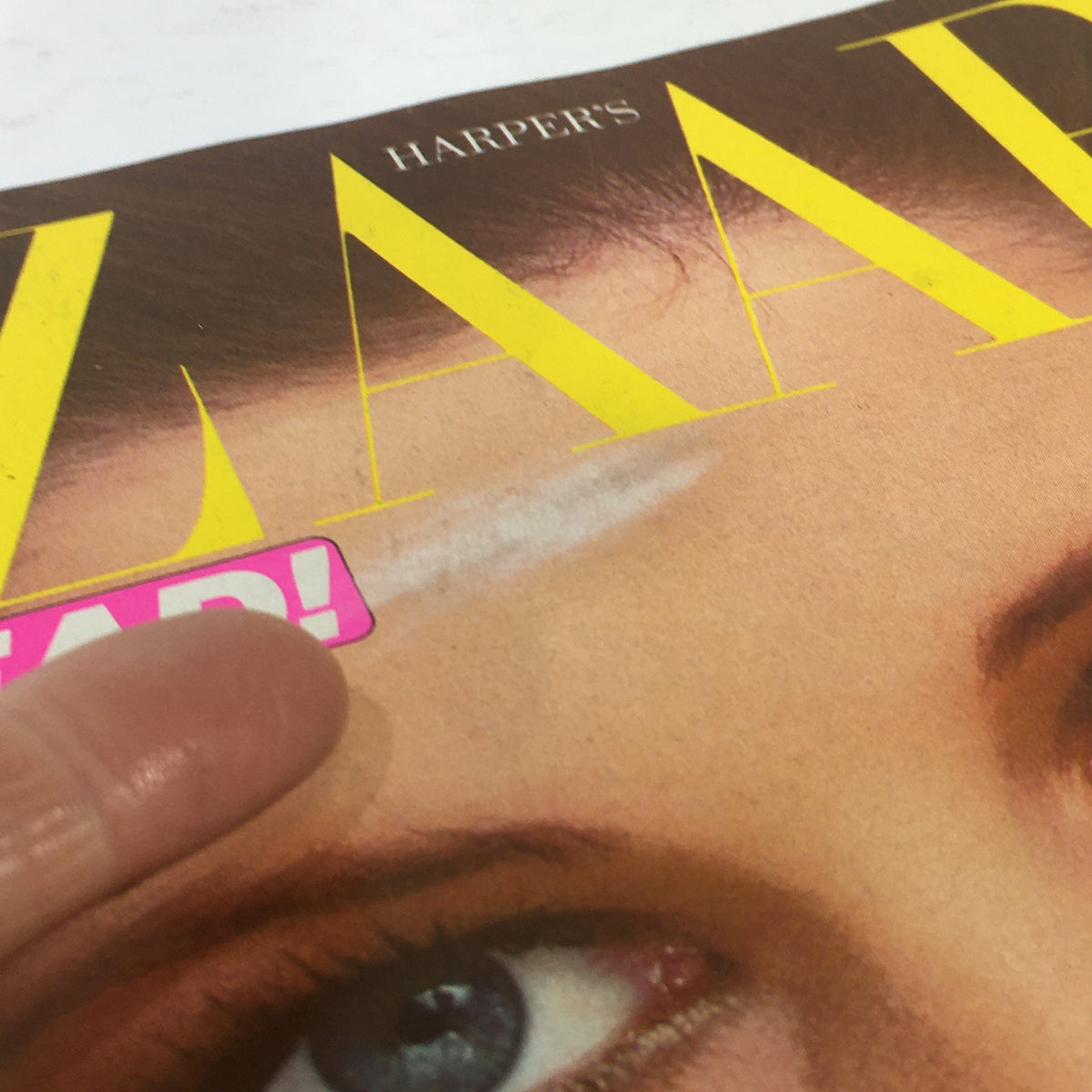 Close-up of VTG Bazaar Magazine February 1981 cover showing details of the issue's text and model, focusing on modern fashion and beauty themes.