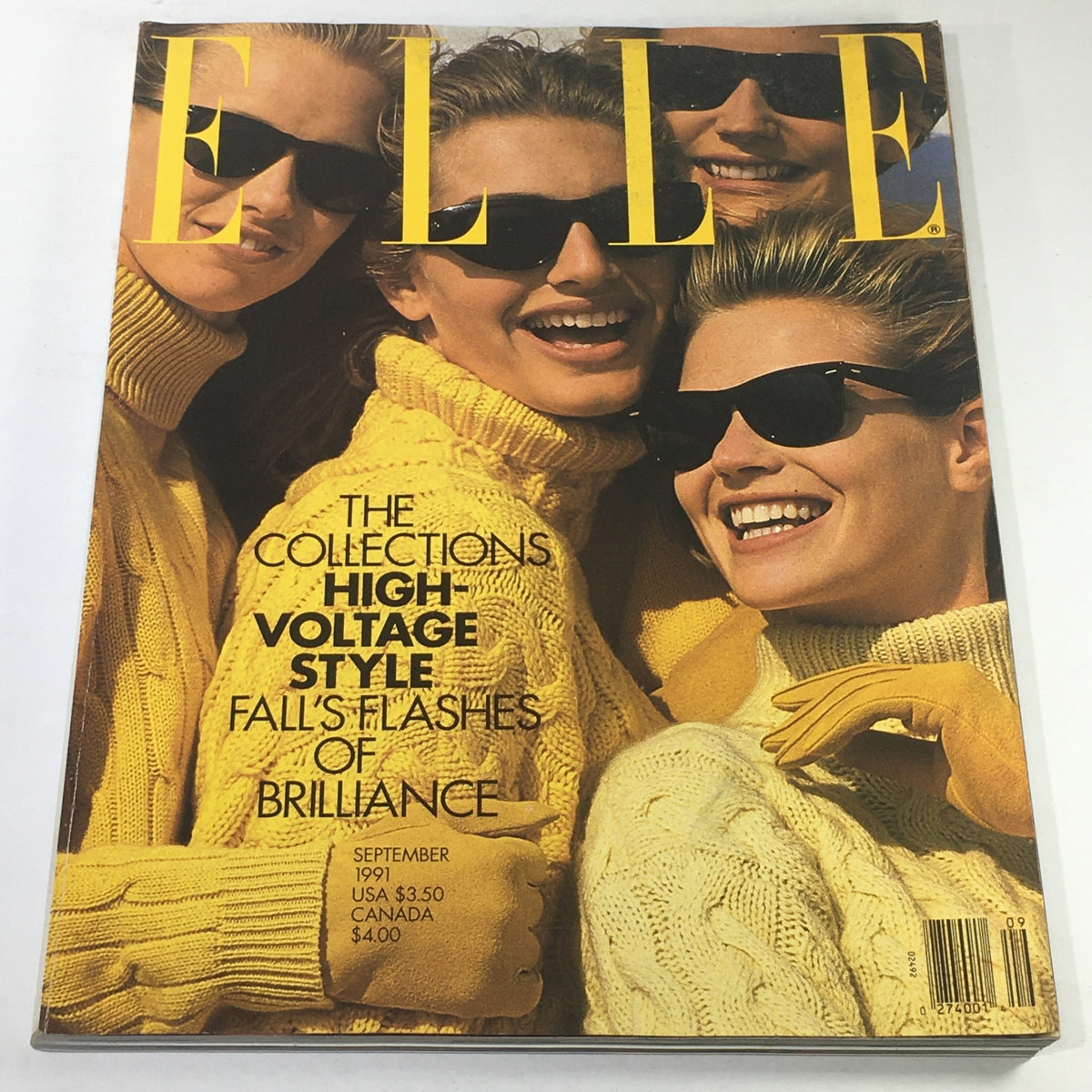 Vintage Elle Magazine September 1991 cover featuring models in yellow sweaters and sunglasses, highlighting high voltage style and fashion trends.