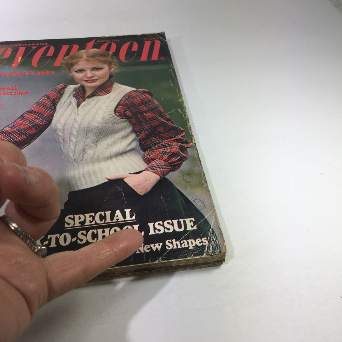 Close-up of the cover of the August 1976 Seventeen Magazine, highlighting the eye-catching graphics and text about fall fashion and lifestyle topics, featuring Margie Swearingen.