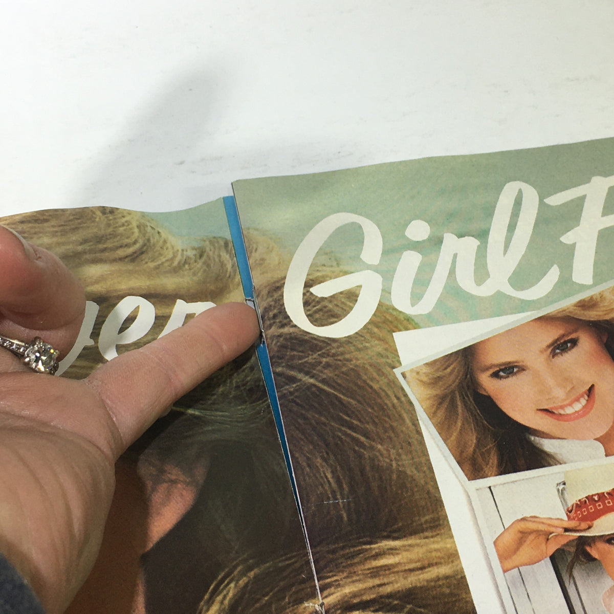Inside view of the VTG Teen Magazine: March 1983, highlighting a detailed look at the magazine's spine and page layout, reflecting the aesthetics of 1980s teenage lifestyle and trends.