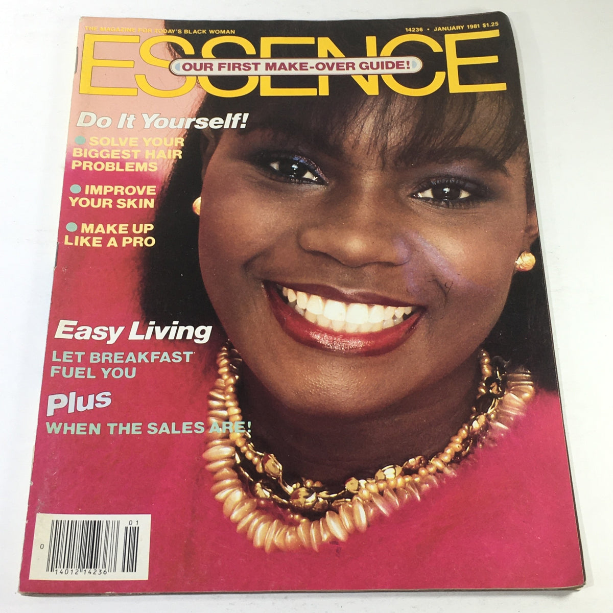 Essence Magazine January 1981 cover featuring a smiling woman, showcasing fashion and beauty tips, and highlighted with a vibrant yellow title.