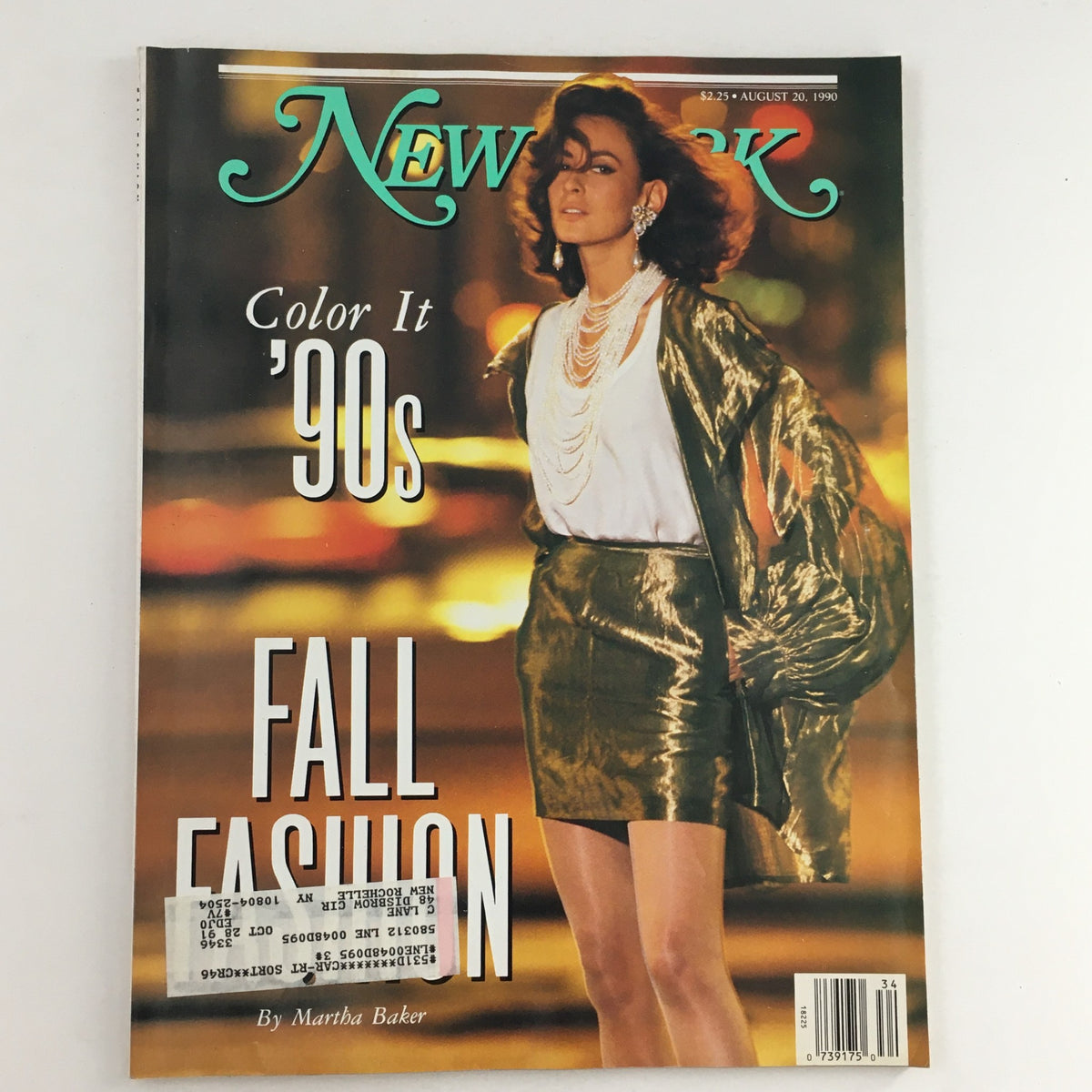 Cover of New York Magazine August 20, 1990 featuring 'Color It 90's Fall Fashion' by Martha Baker, showcasing a model in bold fall fashion attire with vibrant city lights in the background.