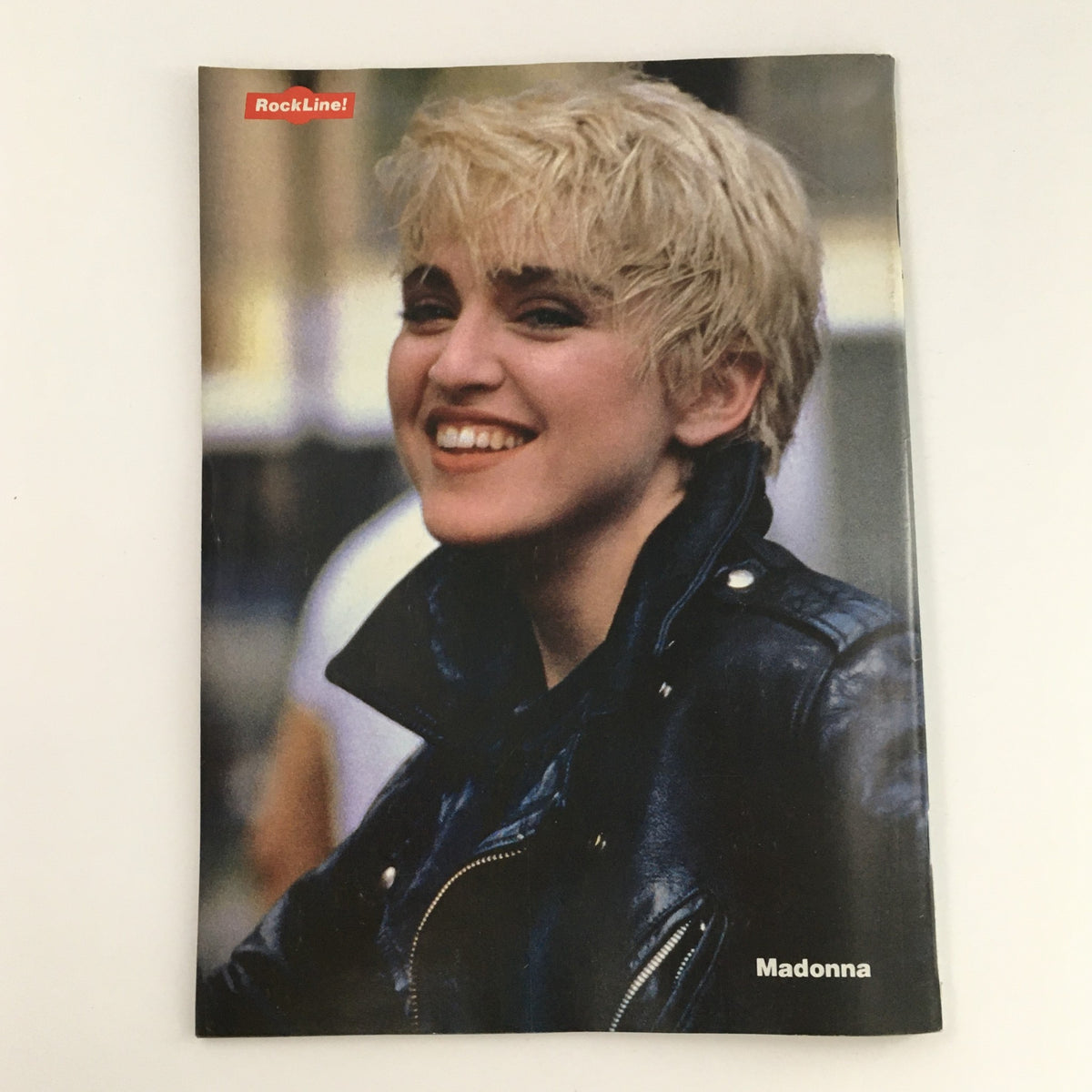 Cover image of 16 Magazine Rockline! December 1986 featuring Madonna. The photograph captures Madonna smiling, reflecting her iconic 80s style and charisma, making this magazine a treasure for pop culture collectors.