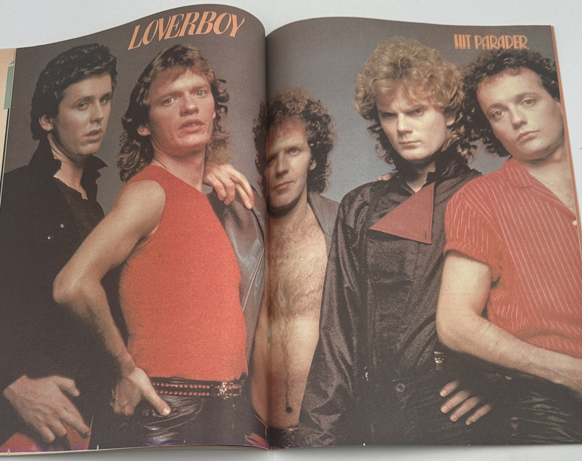 Hit Parader Magazine September 1982 centerfold featuring the band Loverboy in a stylish pose.