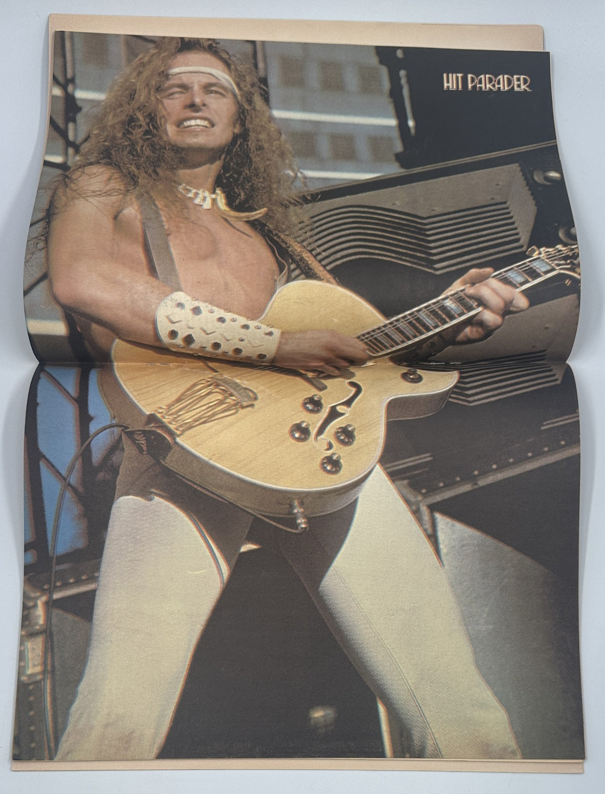 Centerfold from Hit Parader Yearbook Magazine Fall 1979 featuring a live performance image of a rock guitarist with long hair and an electric guitar on stage.