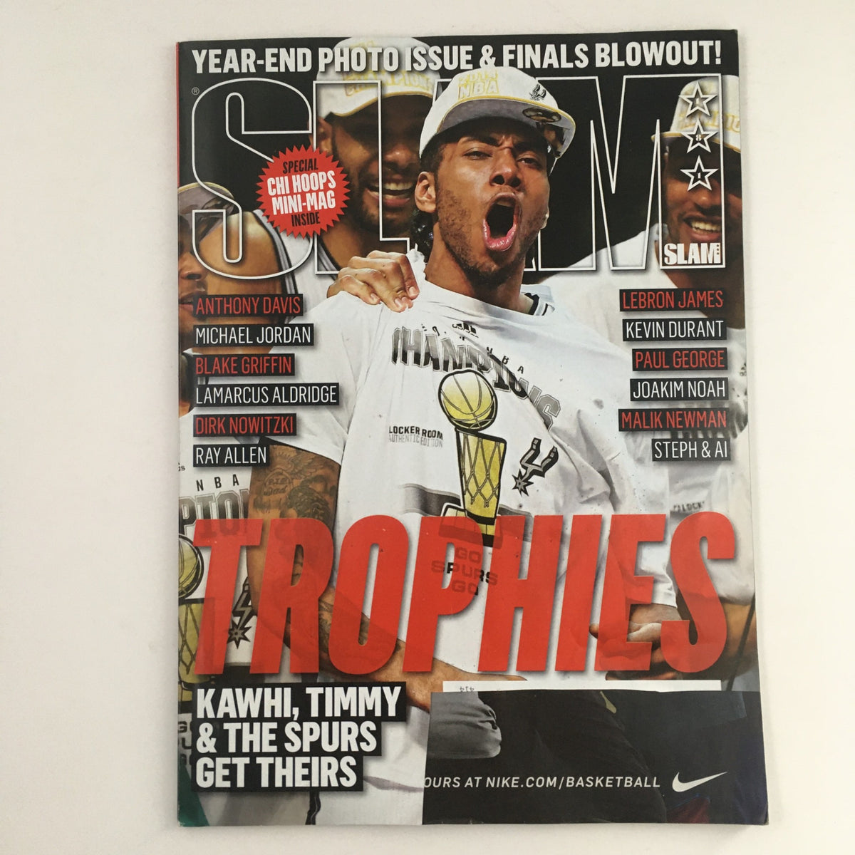 Slam Magazine September 2018 #181 featuring Kawhi Leonard celebrating with trophies, highlighting his achievements and championship success.
