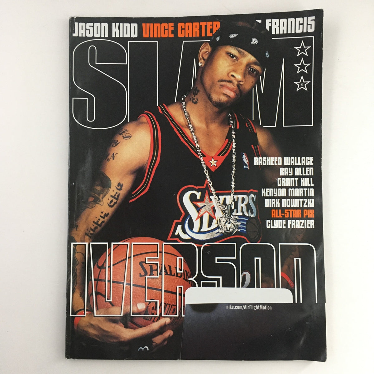 Slam Magazine May 2000 cover featuring Allen Iverson, showcasing his iconic style and presence, alongside Jason Kidd and Vince Carter, highlighting the vibrant era of basketball in the early 2000s.