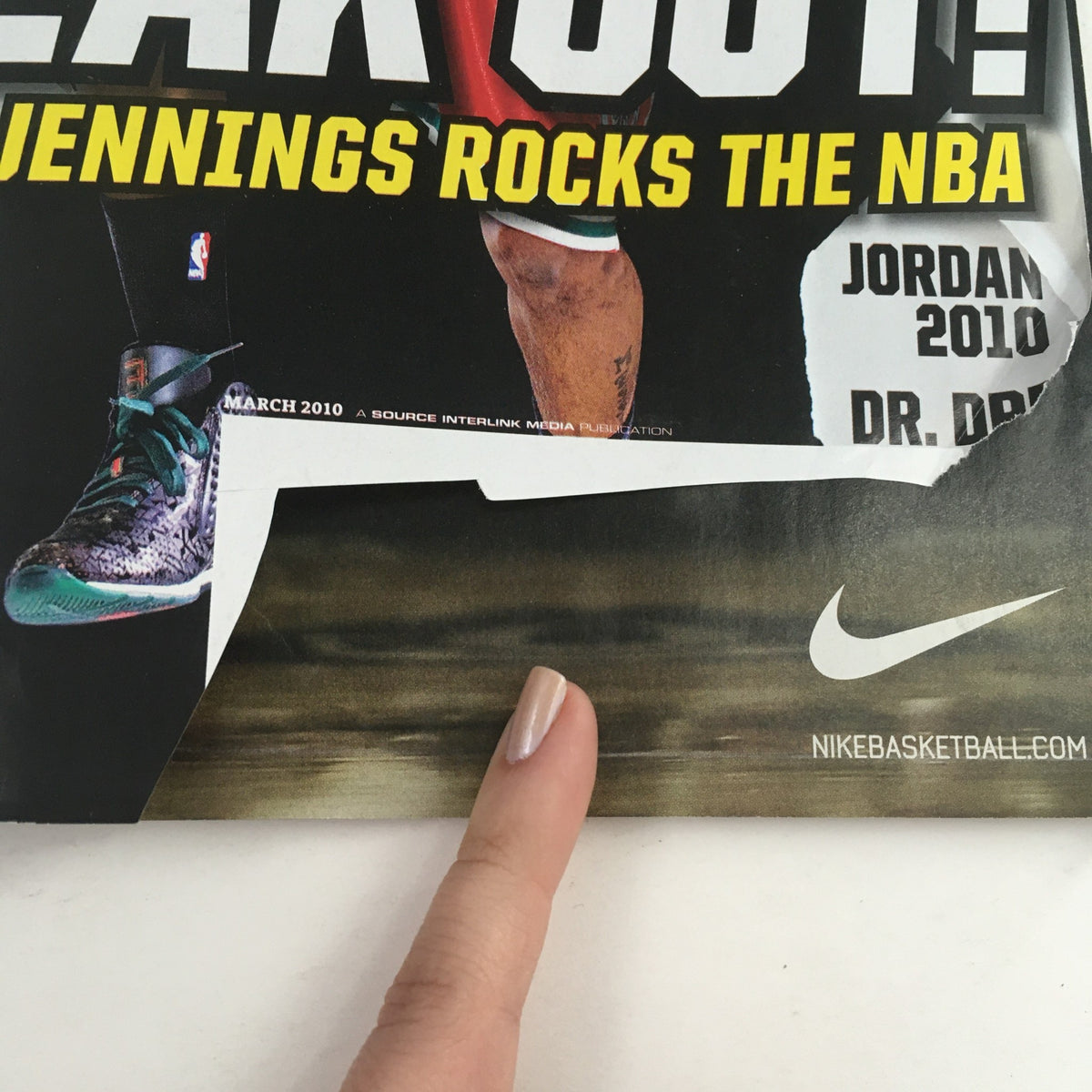 Close-up detail from Slam Magazine March 2010 #135, highlighting a section with Nike branding and the text 'Jordan 2010' along with Brandon Jennings' signature basketball attire.
