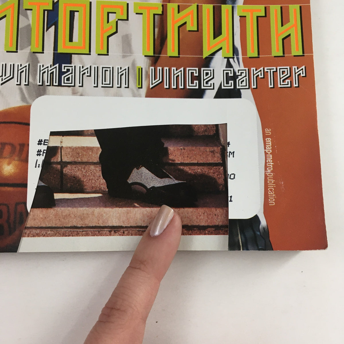 Detail view of the cover of Slam Magazine November 2000 Issue #46 highlighting text related to Tracy McGrady's featured article.