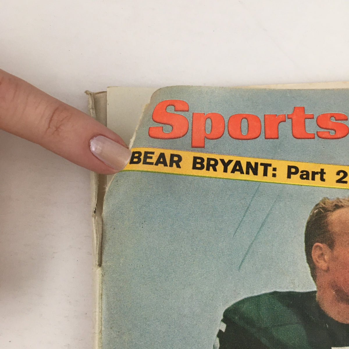 Close-up of the spine of Sports Illustrated Magazine August 22, 1966, highlighting the title and Bear Bryant: Part 2 feature.