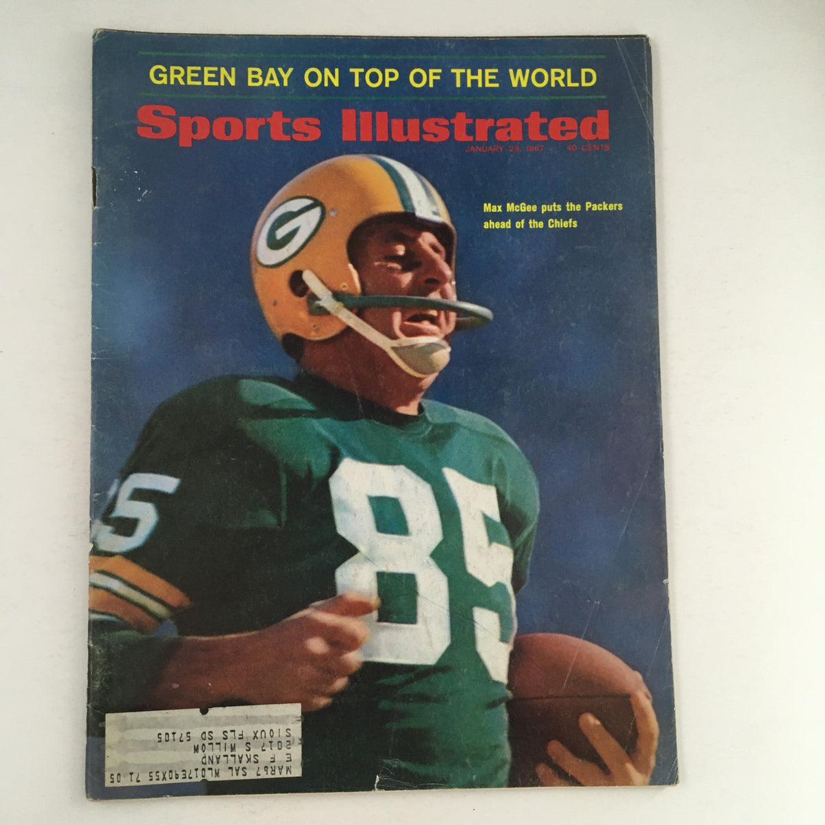 Sports Illustrated Magazine January 23 1967 featuring Max McGee of the Green Bay Packers on the cover, showcasing the NFL star in his number 85 jersey, highlighting a pivotal moment in sports history.