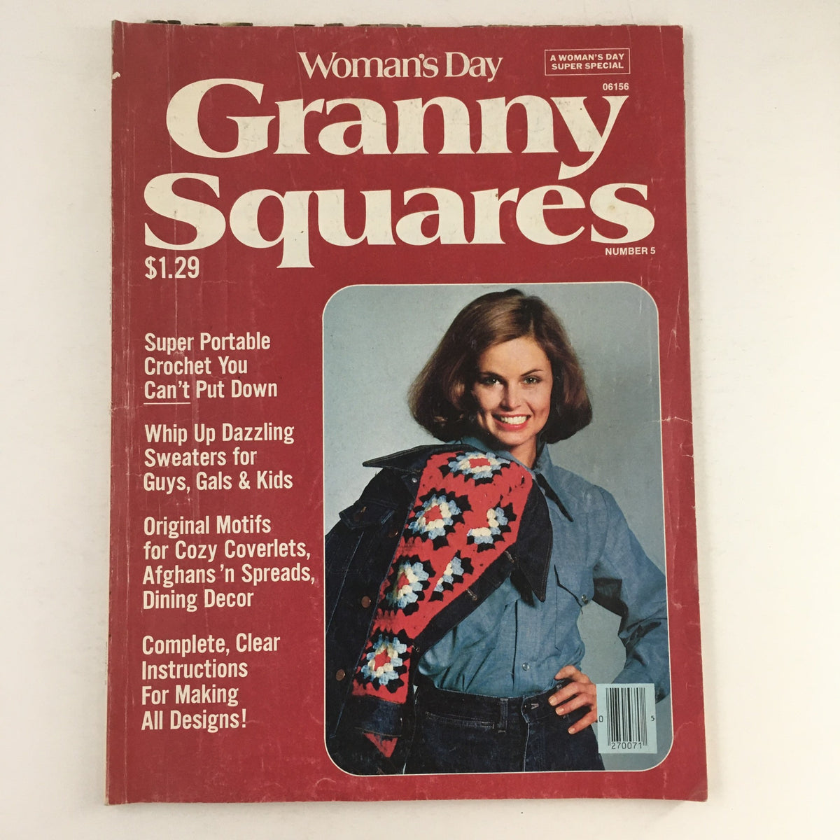 Cover of Woman's Day Magazine #5 1977 featuring Super Portable Crochet & Dazzling Sweater, No Label, showcasing a smiling woman in a stylish outfit with a crochet design, including vibrant colors and graphic text on a red background.