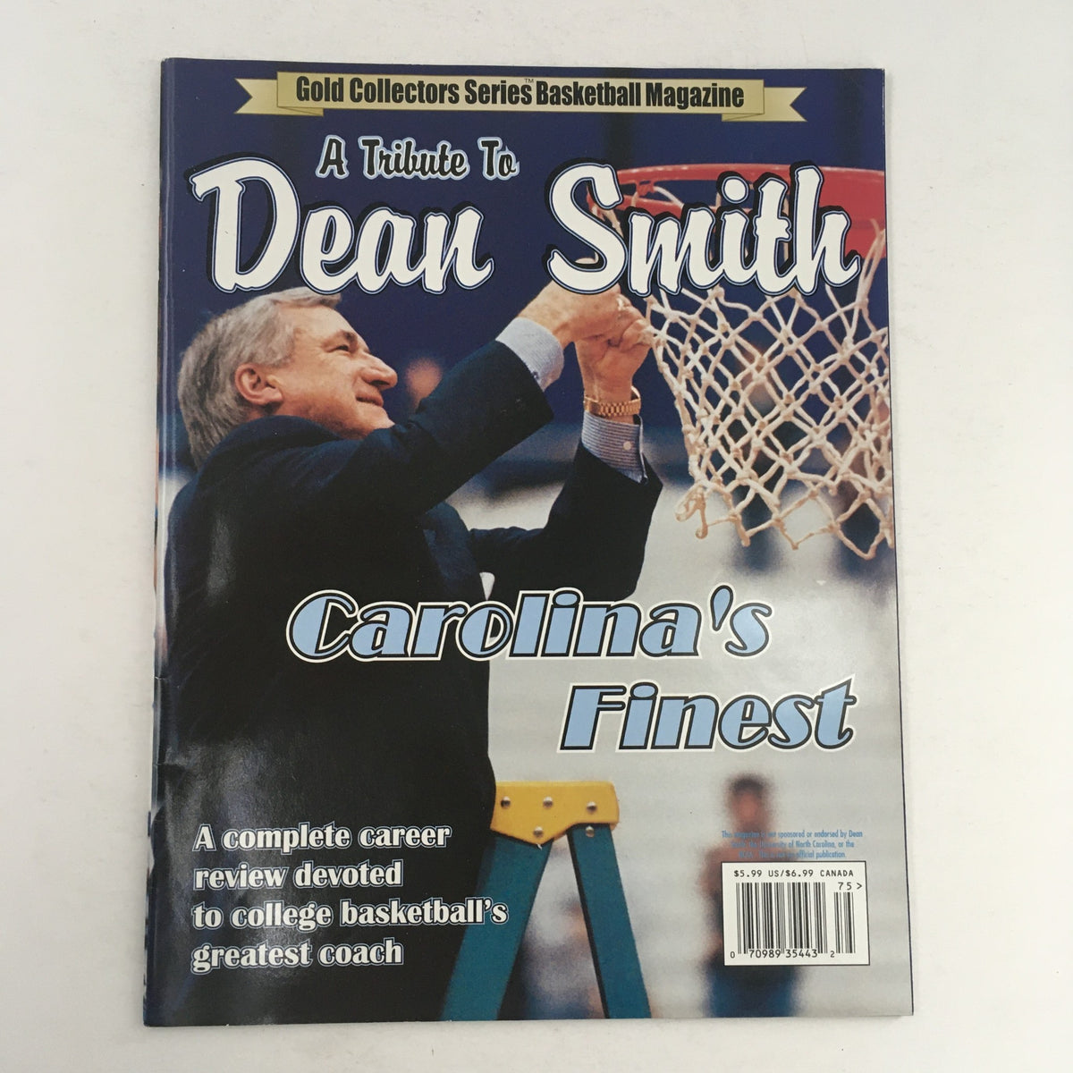 Cover of Gold Collector Series Basketball Magazine A Tribute To Dean Smith featuring Dean Smith celebrating at a basketball hoop, highlighting his legacy as college basketball's greatest coach.