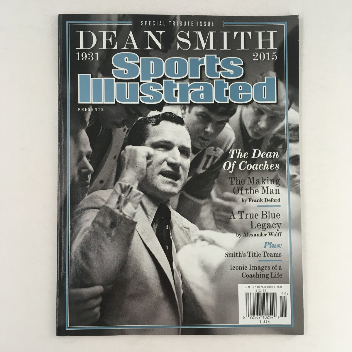 Cover of the 2015 Sports Illustrated Dean Smith Tribute Magazine featuring the title 'The Dean of Coaches', honoring the legacy of legendary basketball coach Dean Smith with images of players and sports highlights.