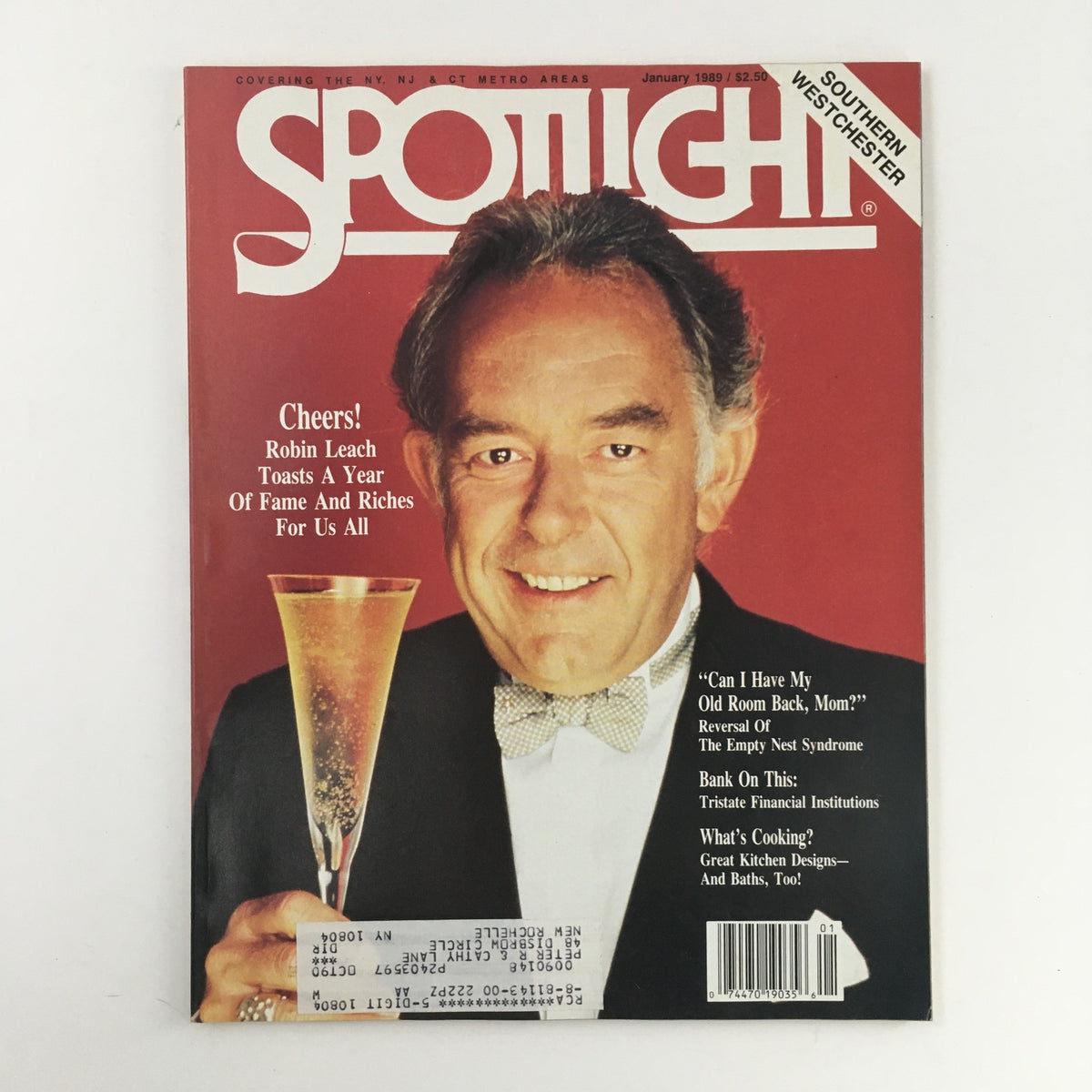 Spotlight Magazine January 1989 featuring Robin Leach, celebrating a year of fame and riches, with a champagne glass on the cover, in very good condition.