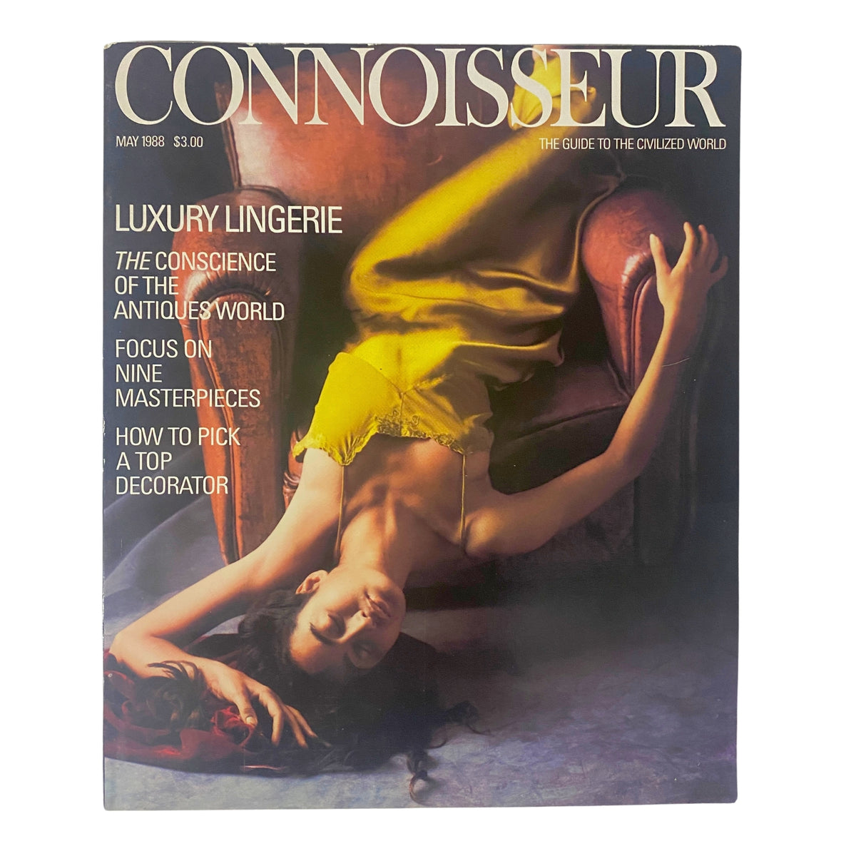 Connoisseur Magazine May 1988 issue featuring luxury lingerie on the cover, showcasing a model in a yellow dress posed elegantly on a chair.